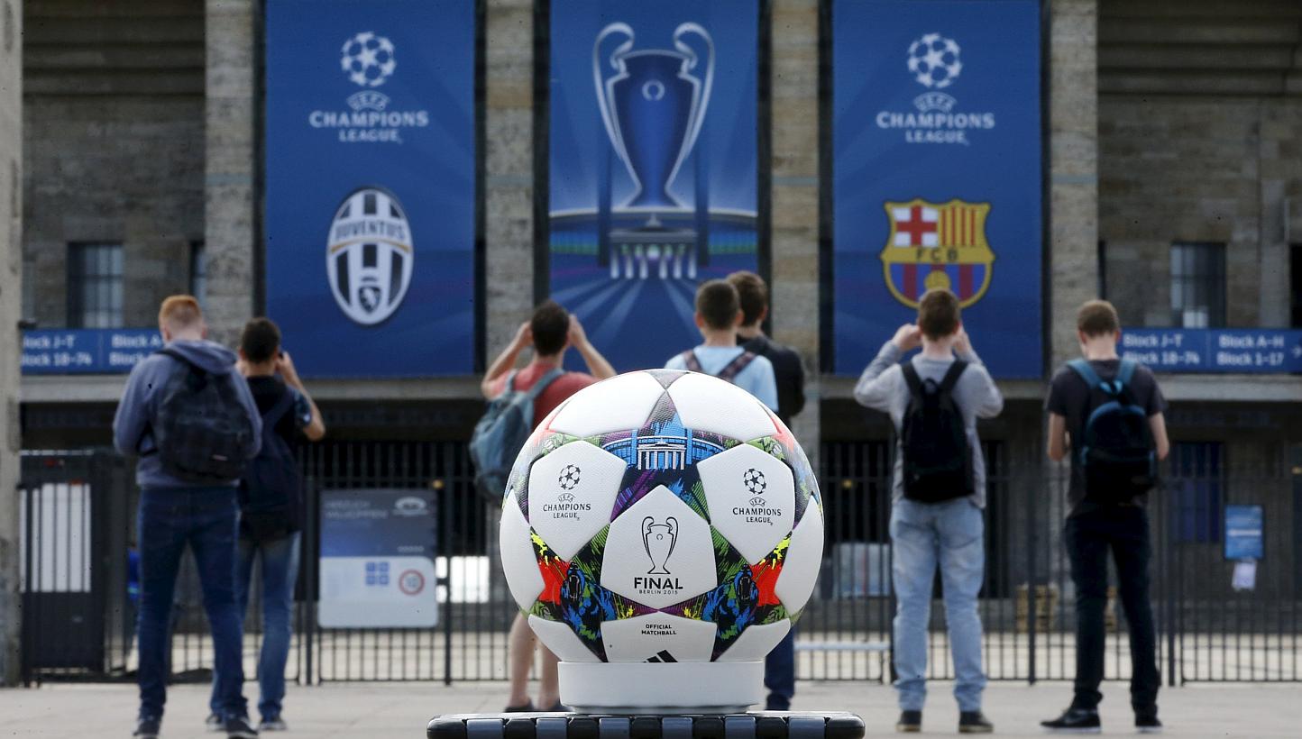 The official Adidas match ball being used for the June 6, 2015, Champions League final between Barcelona and Juventus in Berlin is pictured in front of the&nbsp; Olympiastadion on June 2. -- PHOTO: REUTERS