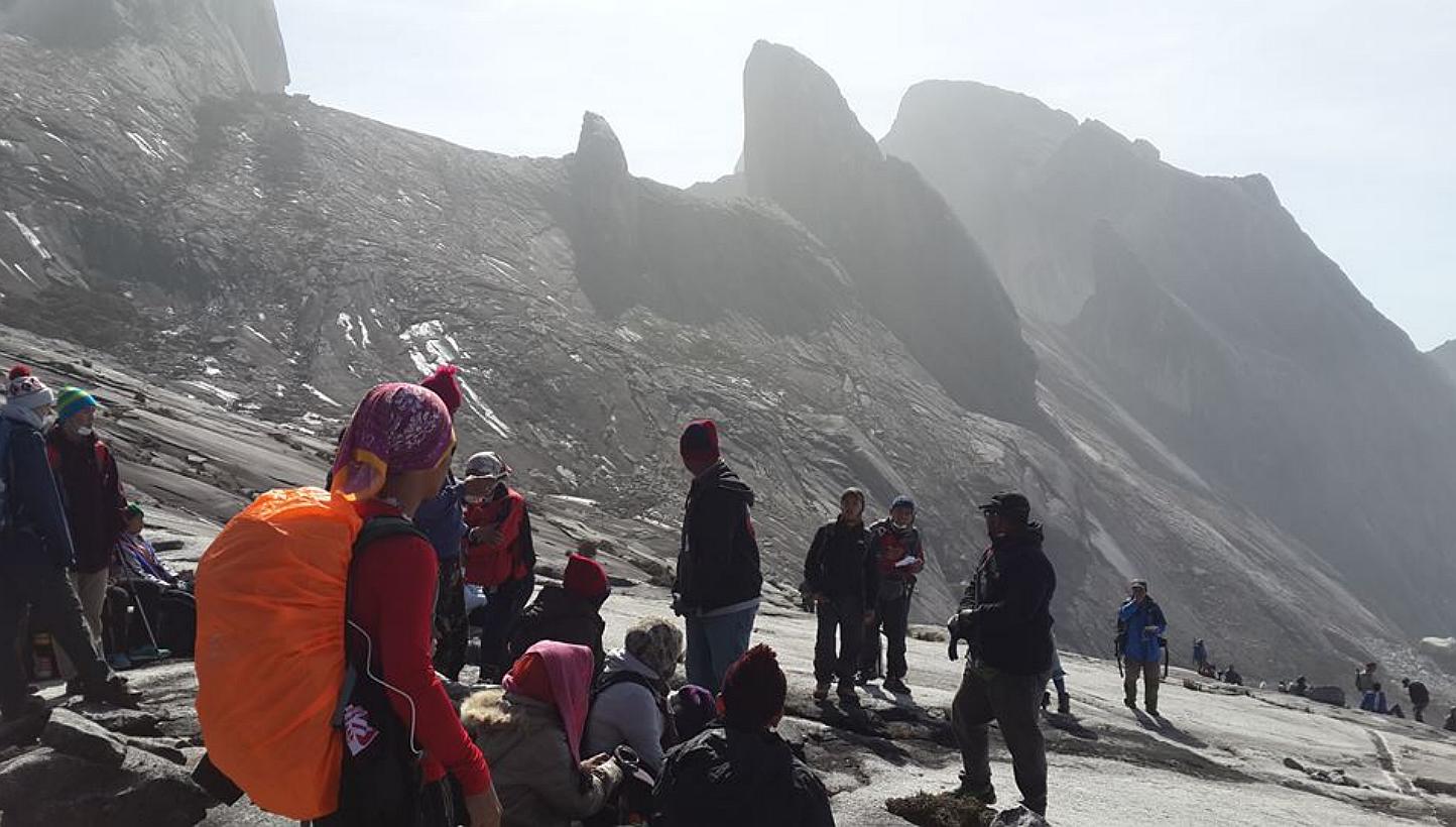 A picture,&nbsp;reportedly taken on&nbsp;Malaysia's Mount Kinabalu in Borneo on June 5, 2015, of climbers&nbsp;waiting for a helicopter after a&nbsp;6.0-magnitude earthquake&nbsp;struck nearby. -- PHOTO: CHARLENE DMP/ FACEBOOK