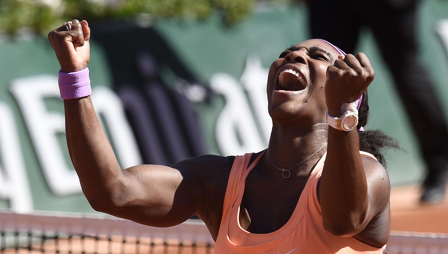 Serena Williams of the US celebrates after defeating Lucie Safarova of the Czech Republic&nbsp;during their women's final match of the Roland Garros French Tennis Open in Paris on June 6, 2015. -- PHOTO: AFP