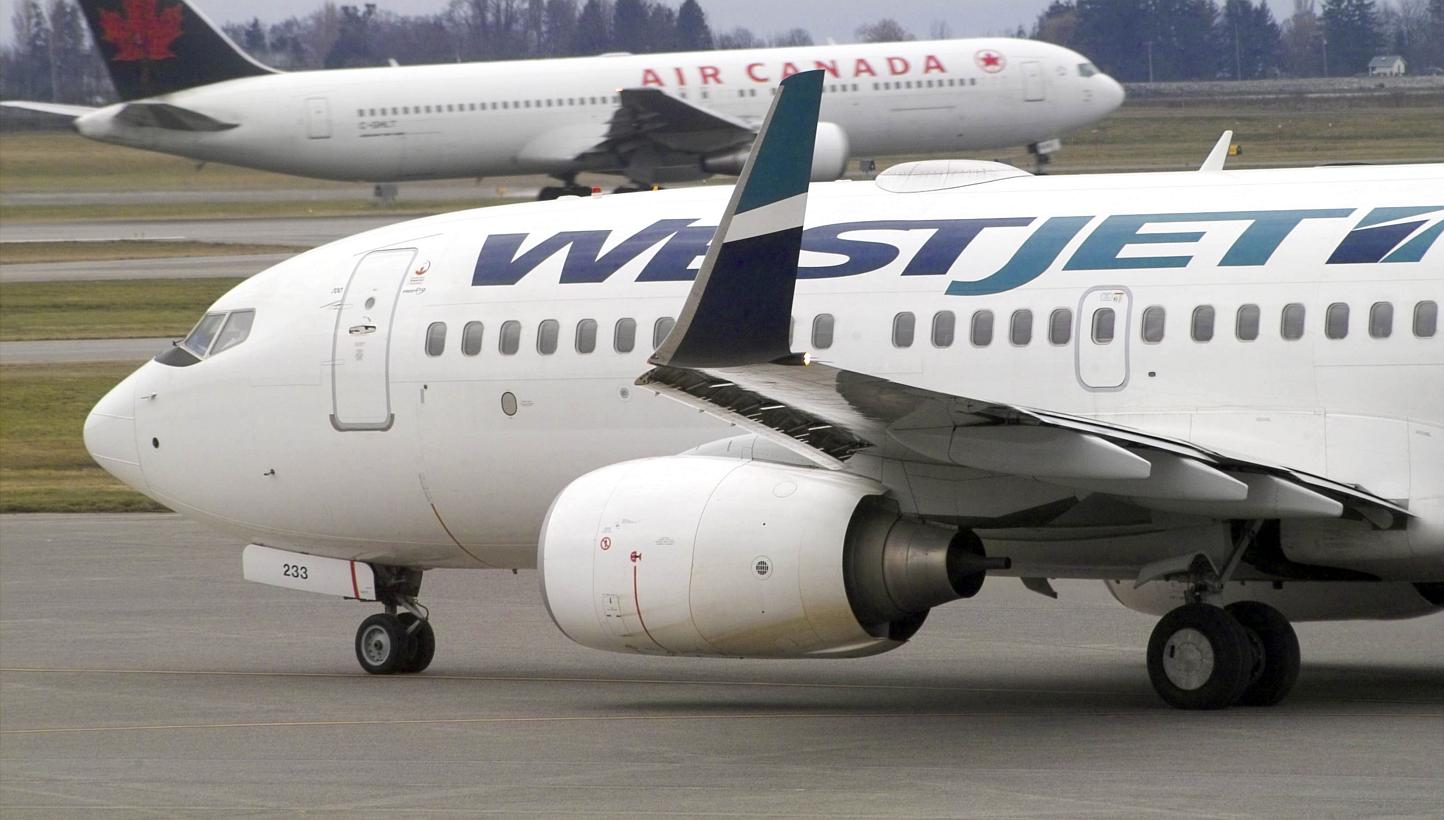A Canadian domestic Westjet flight from Toronto skidded off the end of a runway at Montreal airport during a thunderstorm on Friday, June 5, 2015, but no injuries were reported. -- PHOTO: BLOOMBERG