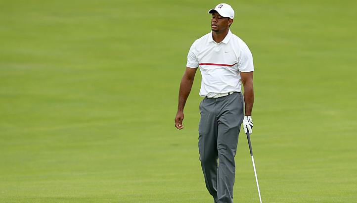 Tiger Woods reacts to a poor second shot on the 17th hole during the third round of The Memorial Tournament presented by Nationwide at Muirfield Village Golf Club on June 6, 2015 in Dublin, Ohio. -- PHOTO: AFP