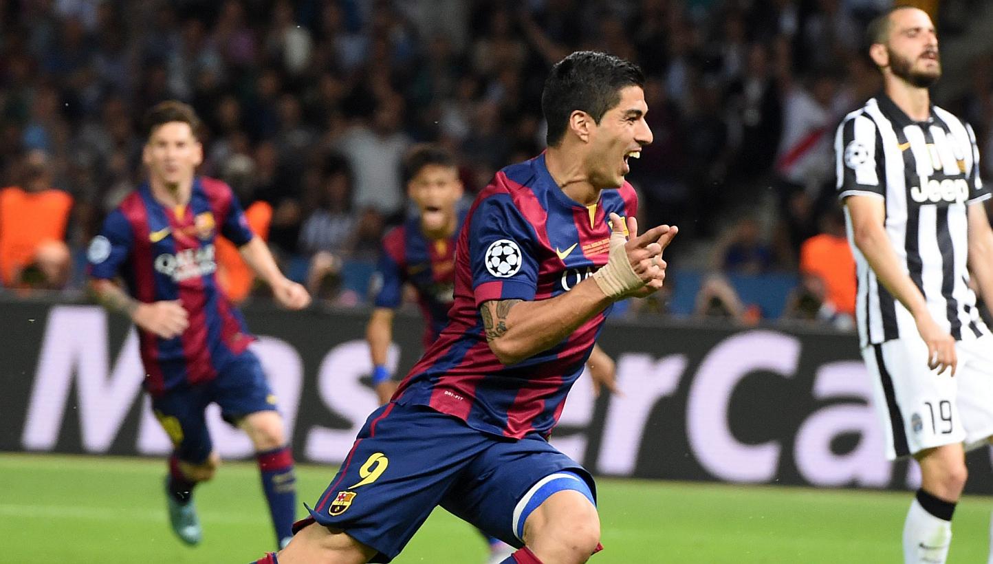 Barcelona's Luis Suarez (centre) celebrating after scoring to give his team a 2-1 lead during the UEFA Champions League final soccer match against Juventus during the Champions' League final at Olympiastadion in Berlin, Germany, on June 6, 2015. Addi