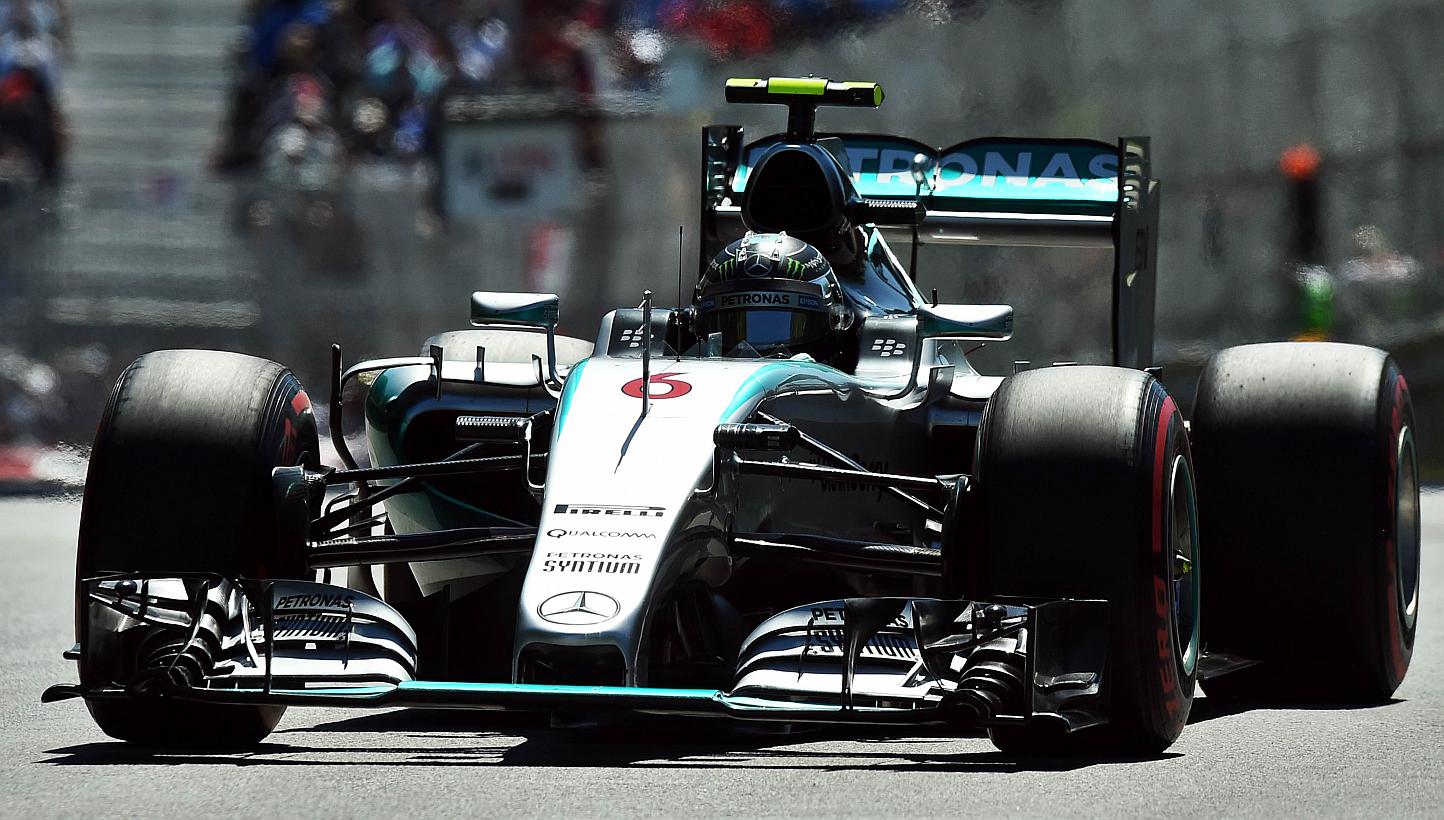 Mercedes AMG Petronas German driver Nico Rosberg races at the Circuit Gilles Villeneuve in Montreal on June 6, 2015. Rosberg finished in first place after the final free practice session, while teammate Lewis Hamilton of Britain ended up last. -- PHO