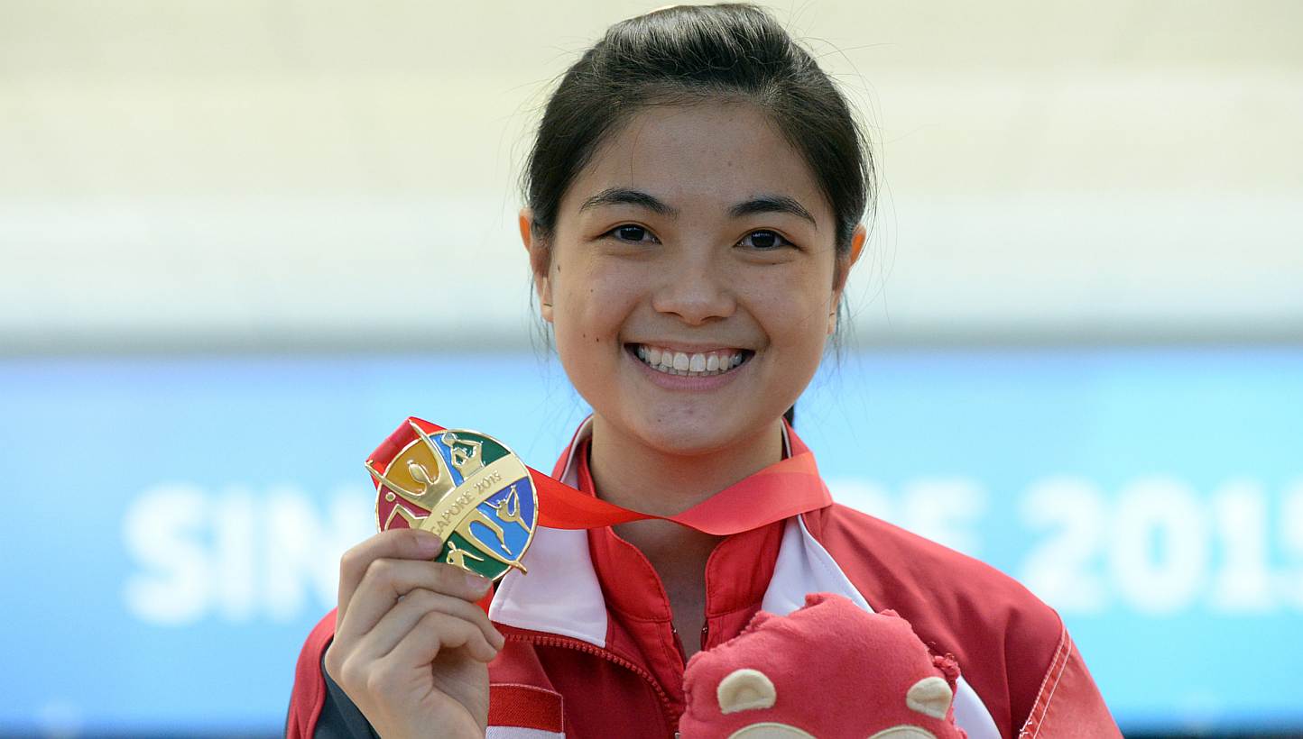 Singapore bowler Daphne Tan with her gold medal after winning the women's singles on June 9, 2015.&nbsp;-- ST PHOTO: DESMOND FOO