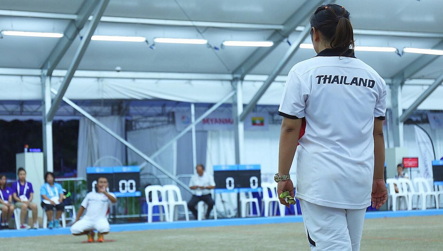 Thailand affirmed their status as South-east Asia's petanque powerhouse by clinching their third gold on June 9, 2015. -- ST PHOTO: JEREMY LIM
