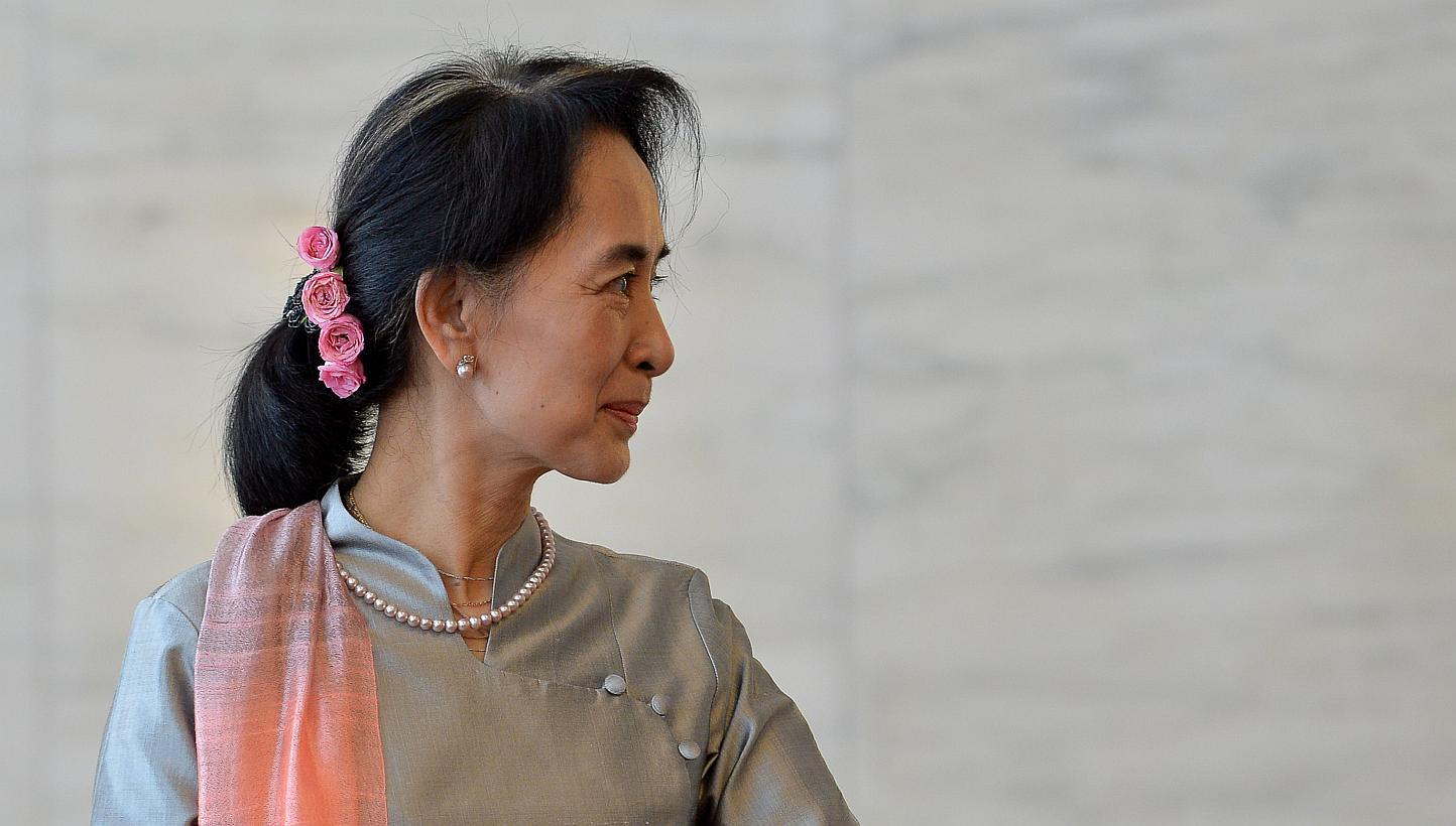 Myanmar's ruling party on Thursday released a draft bill on changes to its junta-era constitution that could end an effective army veto on charter amendments, but still bars opposition leader Aung San Suu Kyi from the presidency. -- PHOTO: AFP&nbsp;
