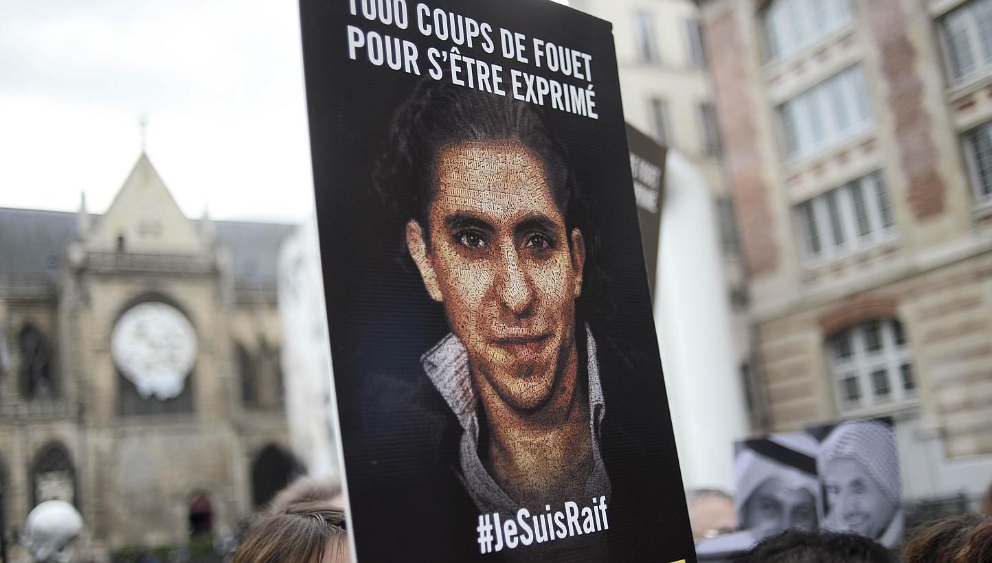 People demonstrate in support of Raif Badawi, who was sentenced to 1,000 lashes for "insulting Islam", on May 7, 2015, in Paris. -- PHOTO: AFP