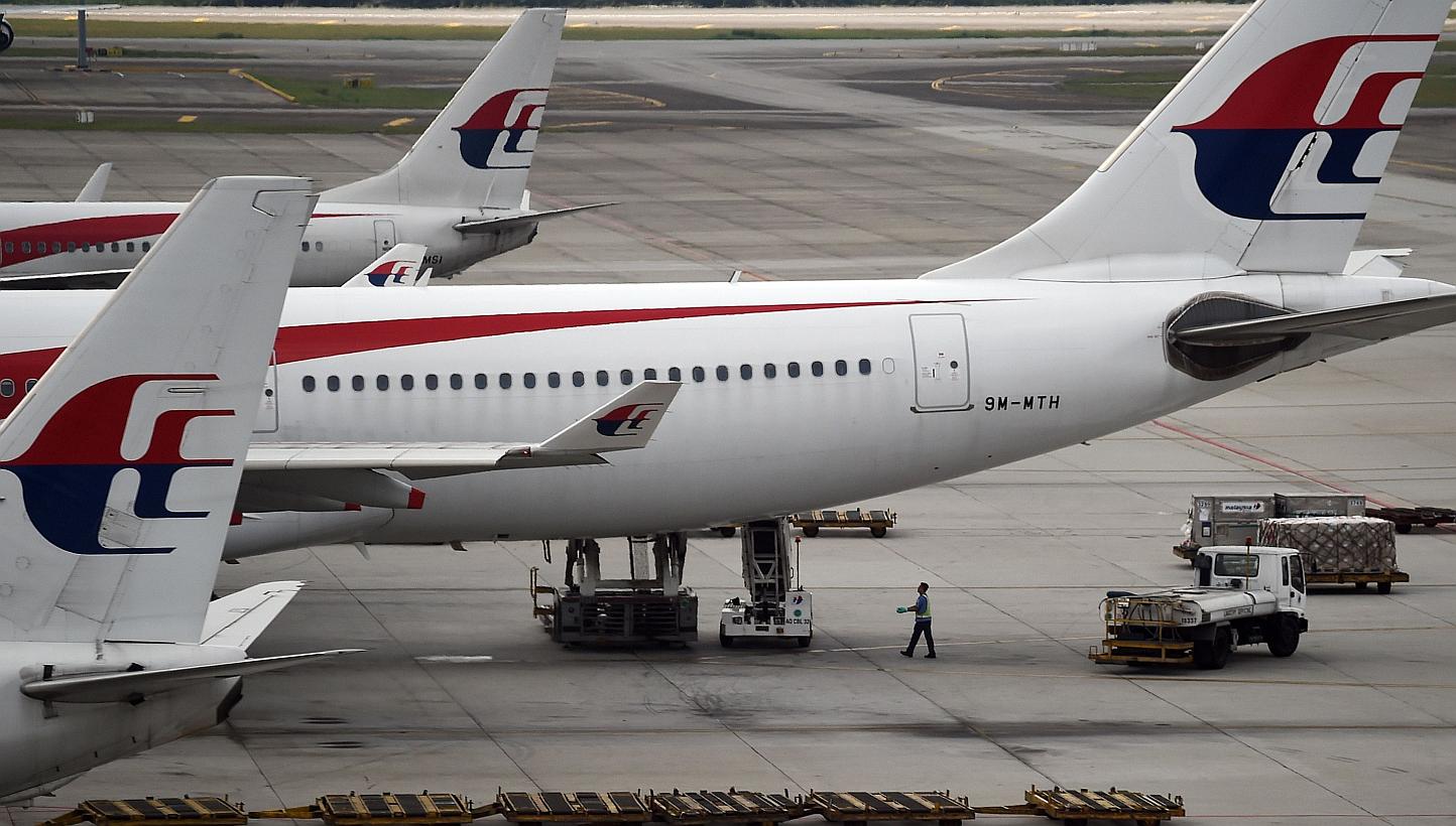 A Malaysia Airlines (MAS) flight returned safely to Melbourne on Friday, having turned back within minutes of take-off after an engine fire alert went off, Air Services Australia said. -- PHOTO: AFP