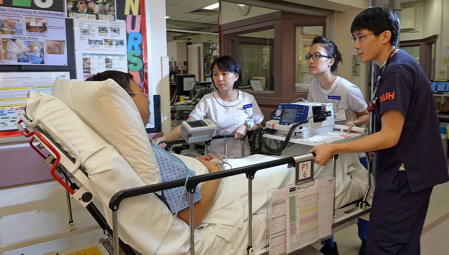 Healthcare staff from the National University Hospital are now able to tap on an extra $120,000 a year to train their peers in South-east Asia and China. -- ST FILE PHOTO