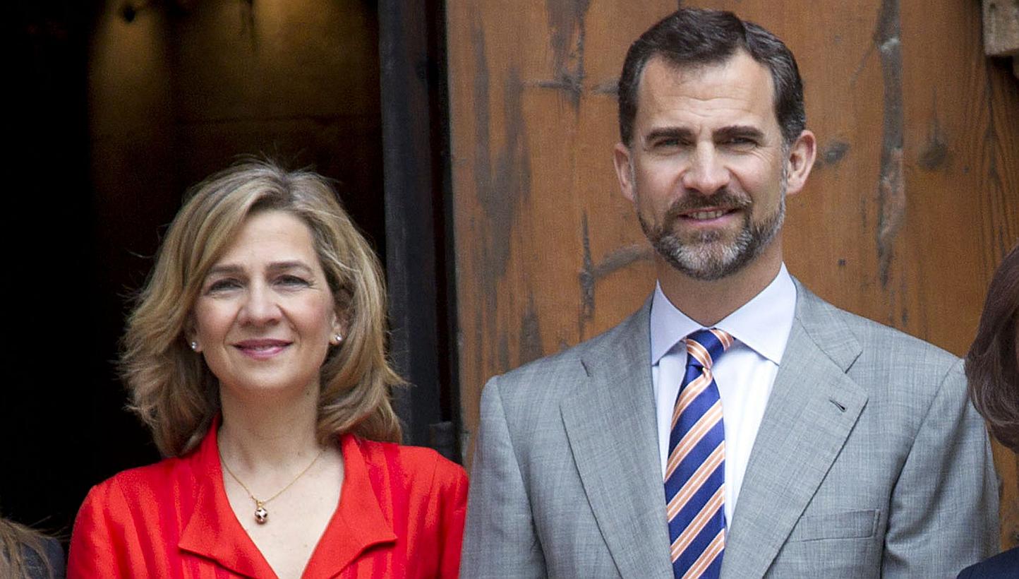 Cristina of Spain (left) and her brother King Felipe VI posing as they arrive for the traditional Easter Mass of Resurection in Palma de Mallorca. King Felipe VI has issued a decree stripping his sister Princess Cristina of her title as Duchess of Pa