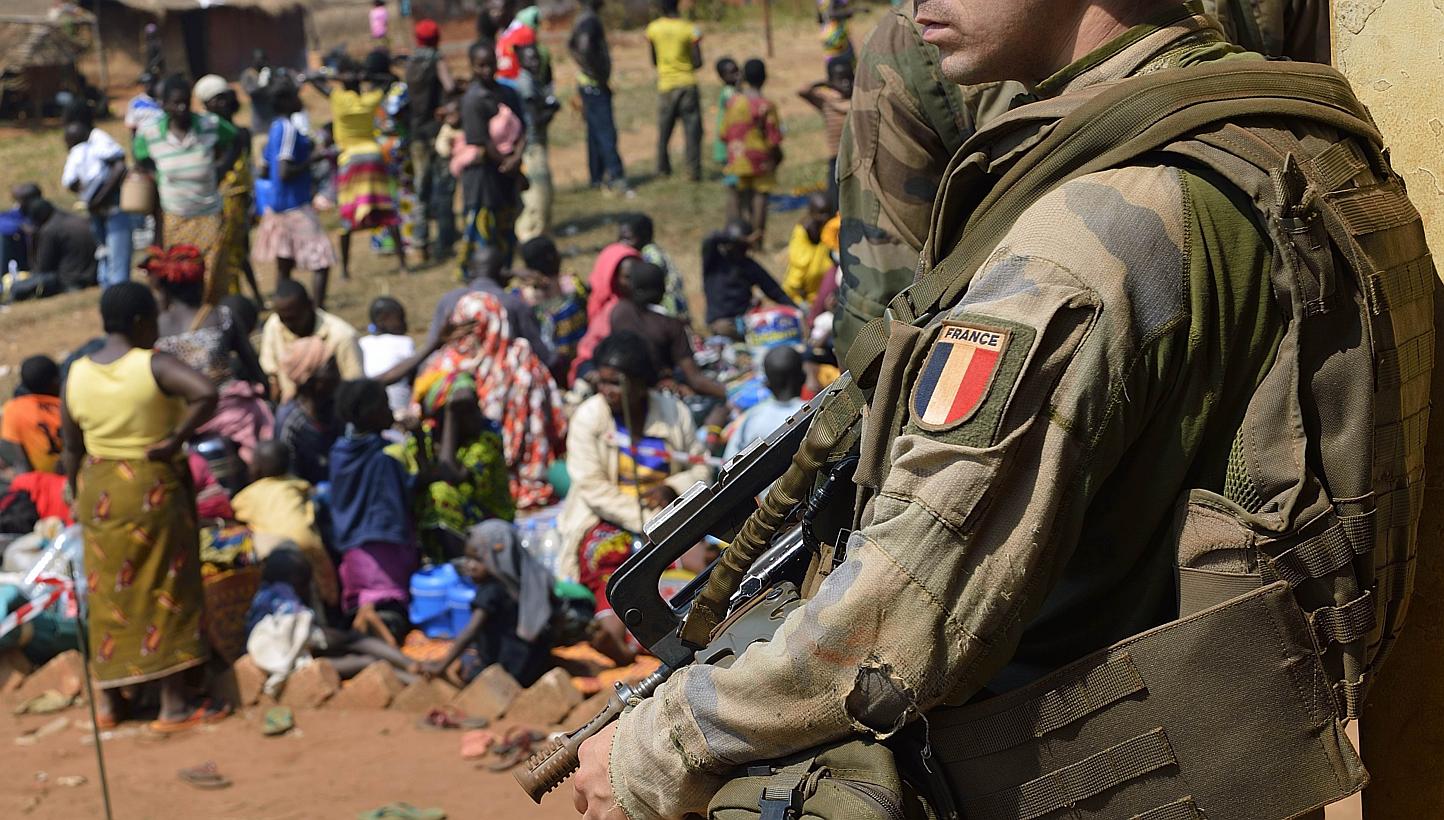 A file photo shows a French peacekeeper standing guard in Boali,&nbsp;some 100km north of Bangui,&nbsp;in&nbsp;the Central African Republic, in January 2014. -- PHOTO: AFP&nbsp;