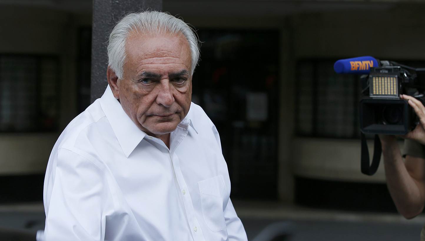 Former FMI head Dominique Strauss-Kahn enters his car as he leaves his apartment in Paris, France, June 12, 2015.&nbsp;-- PHOTO: REUTERS&nbsp;