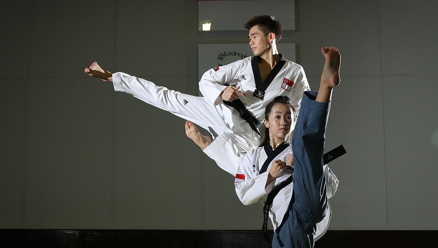 Singapore's taekwondo athletes captured three SEA Games bronze medals at the Singapore Expo Hall 2 on Saturday afternoon. -- ST PHOTO: ONG WEE JIN&nbsp;