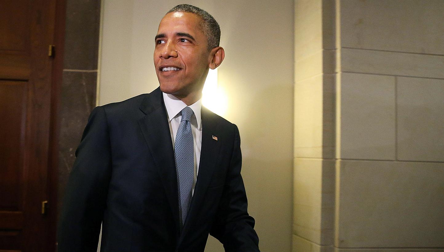 US President Barack Obama departs from a meeting with House Democrats on Capitol Hill on June 12, 2015, in Washington, DC. -- PHOTO: AFP
