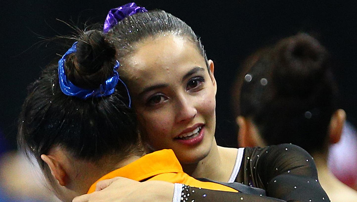 Malaysian gymnast Farah Ann Abdul Hadi (right) recently came under fire from netizens who criticised her competition attire during the SEA Games in Singapore. -- PHOTO: SINGAPORE SEA GAMES ORGANISING COMMITTEE/ACTION IMAGES VIA REUTERS