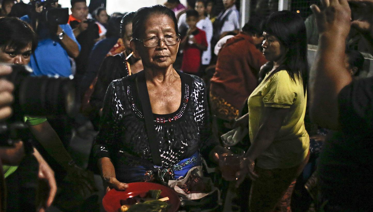 Shaman Singkaban Kowil, 75, of the Kadazan Dusun tribe, one of the people attending Monolibabow ritual performed to appease the spirits of the sacred Mount Kinabalu on Tamparuli district, Kota Kinabalu, Sabah, Malaysia, on June 13, 2015. -- PHOTO: EP