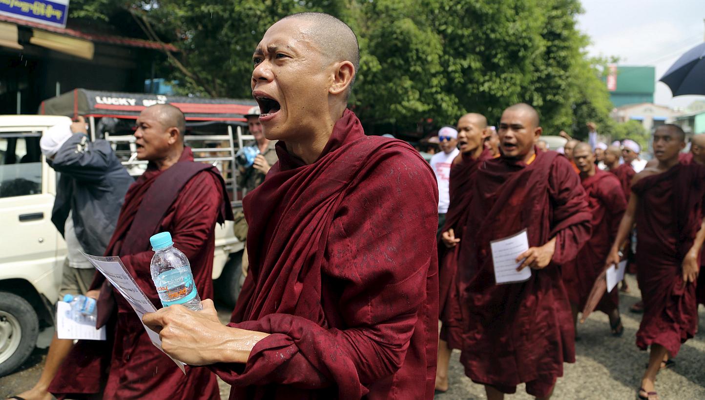 Buddhist monks shout during a march to denounce foreign criticism of the country's treatment of stateless Rohingya Muslims, in Yangon, Myanmar, on May 27, 2015. About 500 Buddhist hardliners, backed by monks, gathered in Sittwe, in troubled Rakhine s