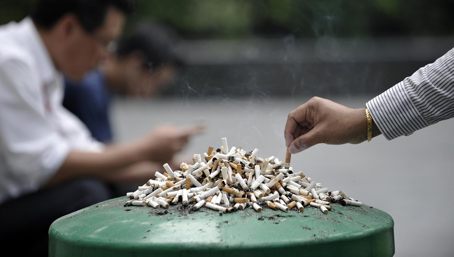 Stubbed-out cigarettes left on a dustbin. The Ministry of Health is moving to ban new forms of cigarettes including smokeless cigarettes and dissolvable tobacco or nicotine from Dec 15, 2015. -- PHOTO: ST FILE 