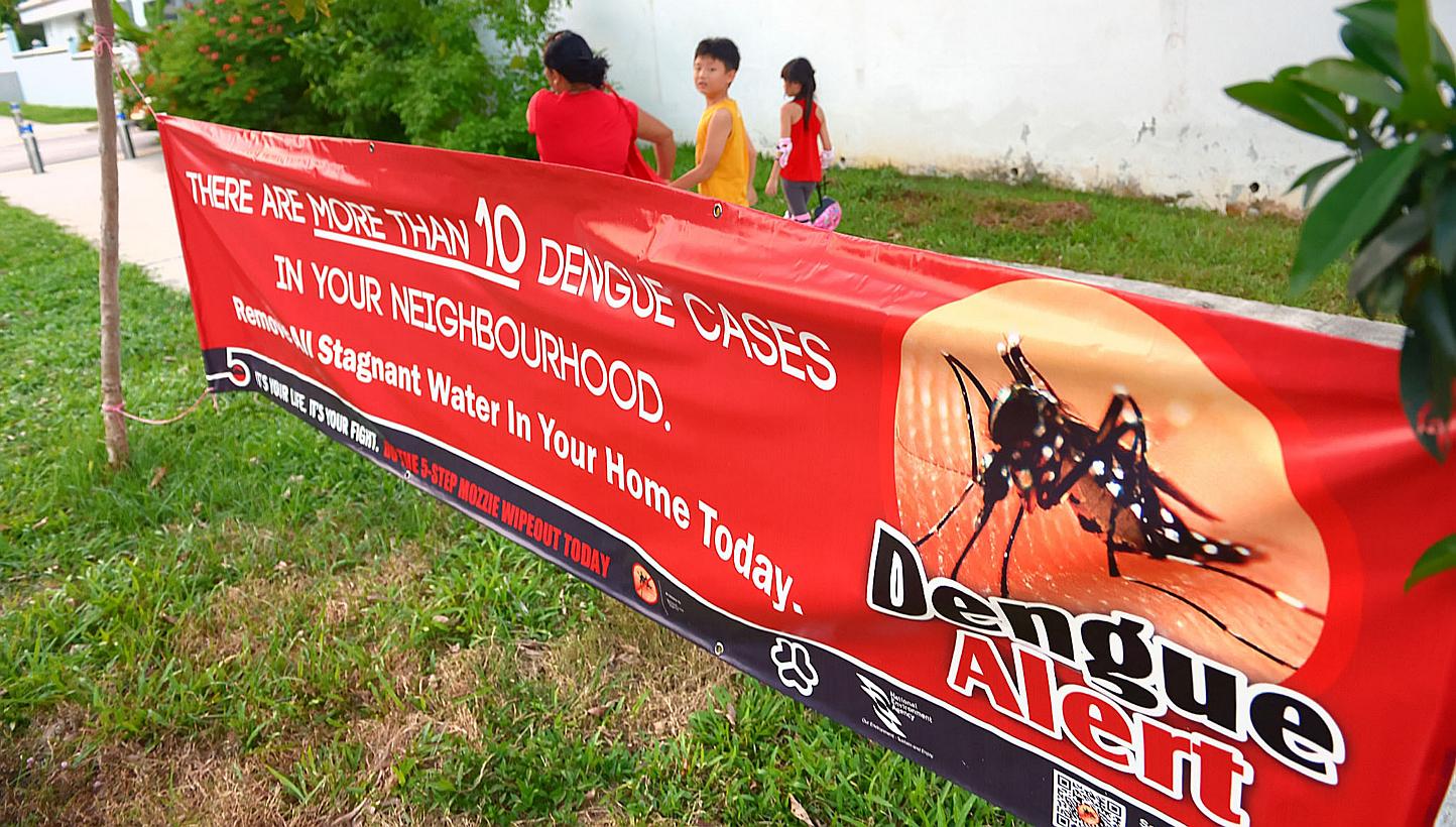 A dengue alert banner in Lorong L, Telok Kurau. The number of dengue cases so far this year has fallen by almost half compared to the same period last year but the National Environment Agency (NEA) has urged Singaporeans to remain vigilant against th