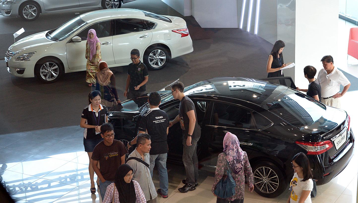 Cars sales buoyed retail sector in Singapore once again, showing a 5 per cent rise in April 2015 compared to the previous year, a release by the Department of Statistics reported on Monday. -- PHOTO: ST FILE