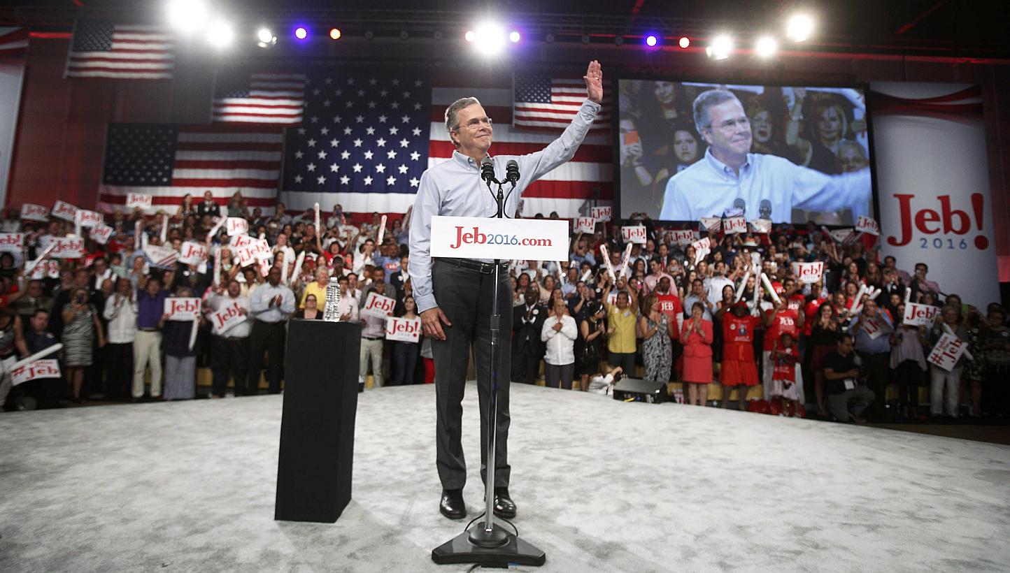 Republican US presidential candidate and former Florida Governor Jeb Bush waving as he arrives to formally announce his campaign for the 2016 Republican presidential nomination during a kickoff rally in Miami, Florida on June 15, 2015. -- PHOTO: REUT
