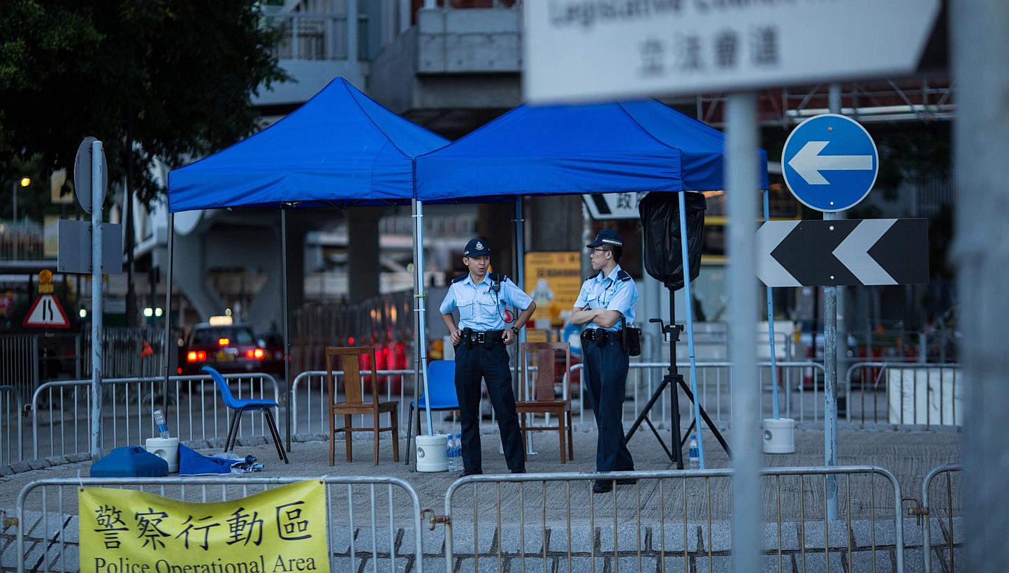 Police stand guard by a roundabout outside the Legislative Council in Hong Kong, China, on June 15, 2015. -- PHOTO: EPA