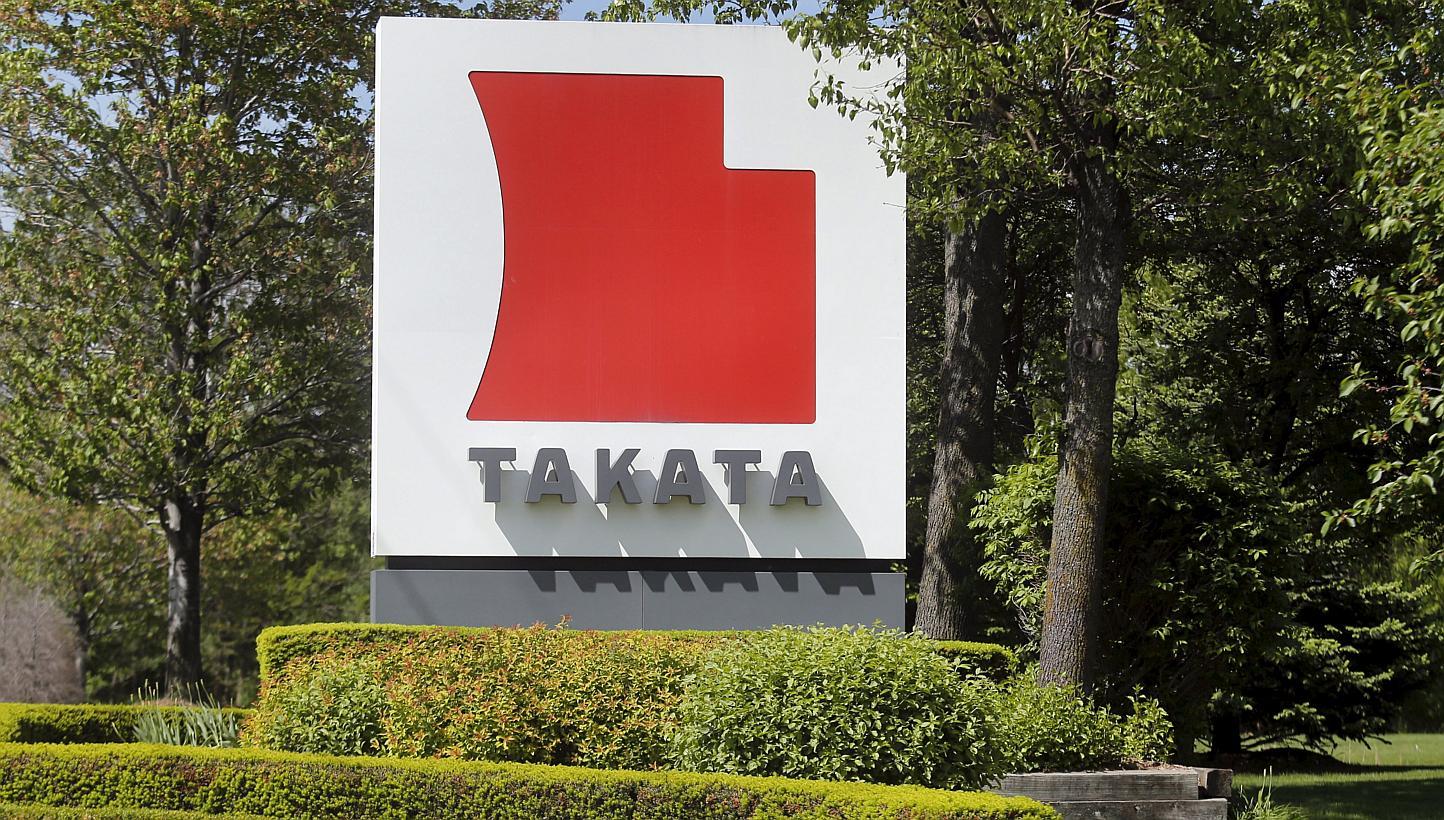 A sign with the Takata logo is seen along the driveway leading to the Takata Corporation building in Auburn Hills, Michigan, in this May 20, 2015 file photograph. -- PHOTO: REUTERS