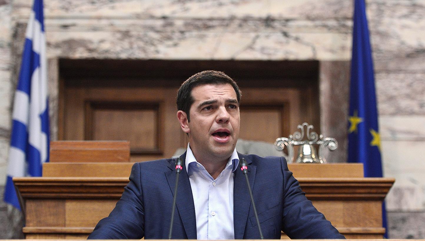 Greek Prime Minister Alexis Tsipras addresses his MP's and ministers at the Greek Parliament in Athens on June 16, 2015. -- PHOTO: AFP