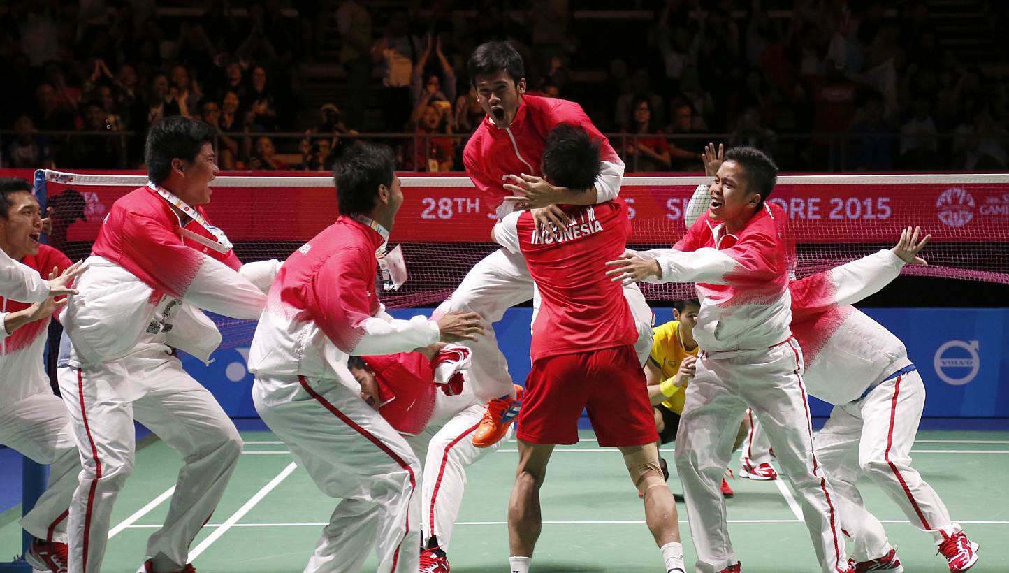 The Indonesia team celebrating on court after they beat Thailand in the badminton men's team final on June 12, 2015. -- PHOTO: SINGAPORE SEA GAMES ORGANISING COMMITTEE/ACTION IMAGES VIA REUTERS 