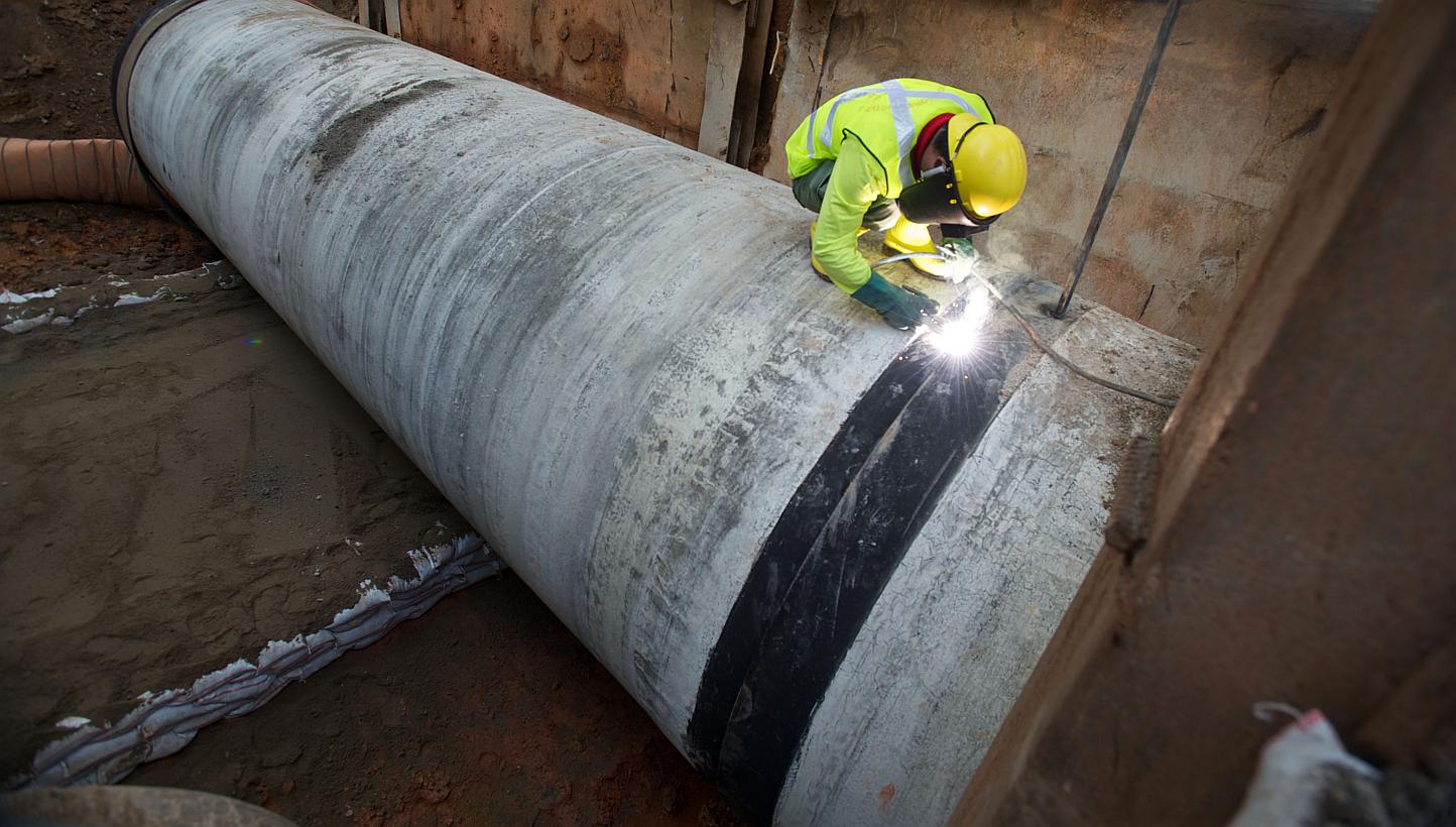 A worker working on water pipes and mains. -- PHOTO: LEY CHOON