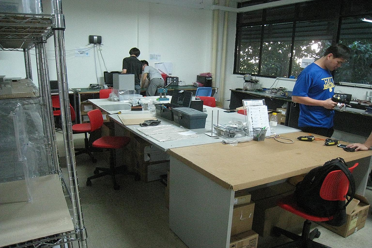 The assembly table at Pirate3D's Kallang facility, where units are assembled by hand. The start-up, which promised its 3,520 Kickstarter backers their own 3D home printer during the 2013 campaign, has fulfilled about a quarter of orders.