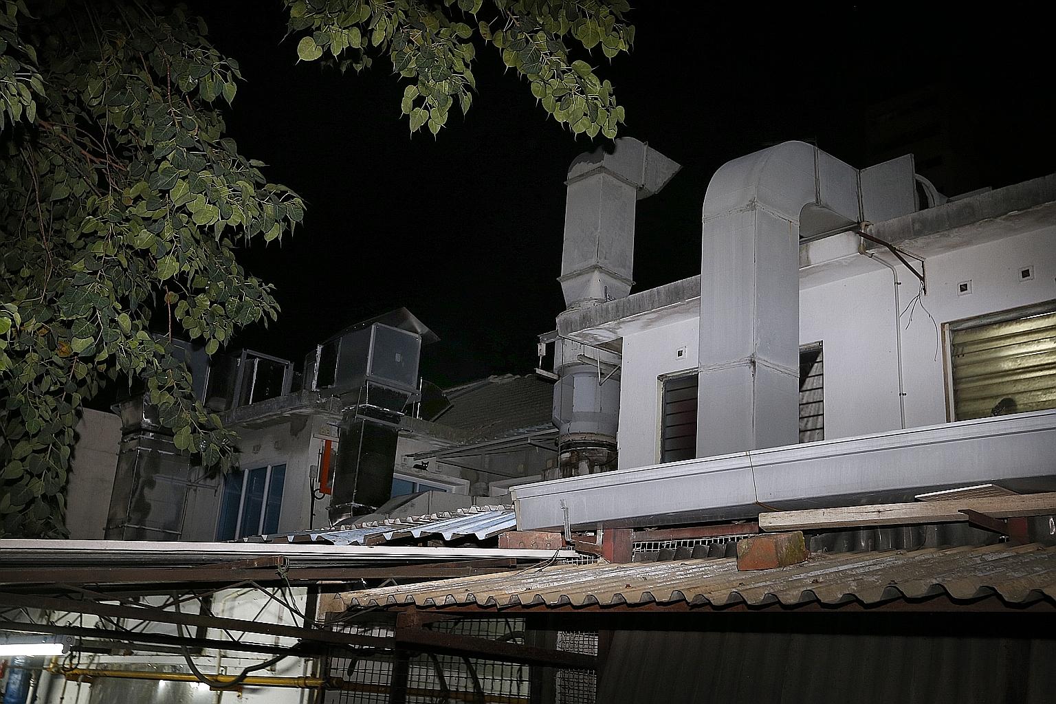 Large metal chimneys at the rear of the eateries in Cheong Chin Nam Road are as close as 3m from the houses in Yuk Tong Avenue.