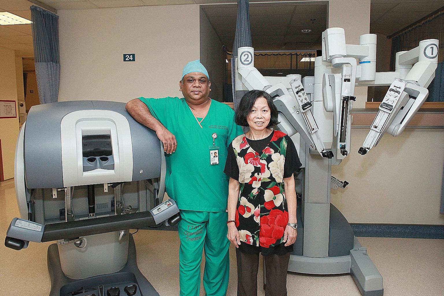 Dr Aneez Ahmed successfully operated on Madam Woo Quai Kuen using robot arms. The 68-year-old cook was discharged three days after a lump in her lung was removed.