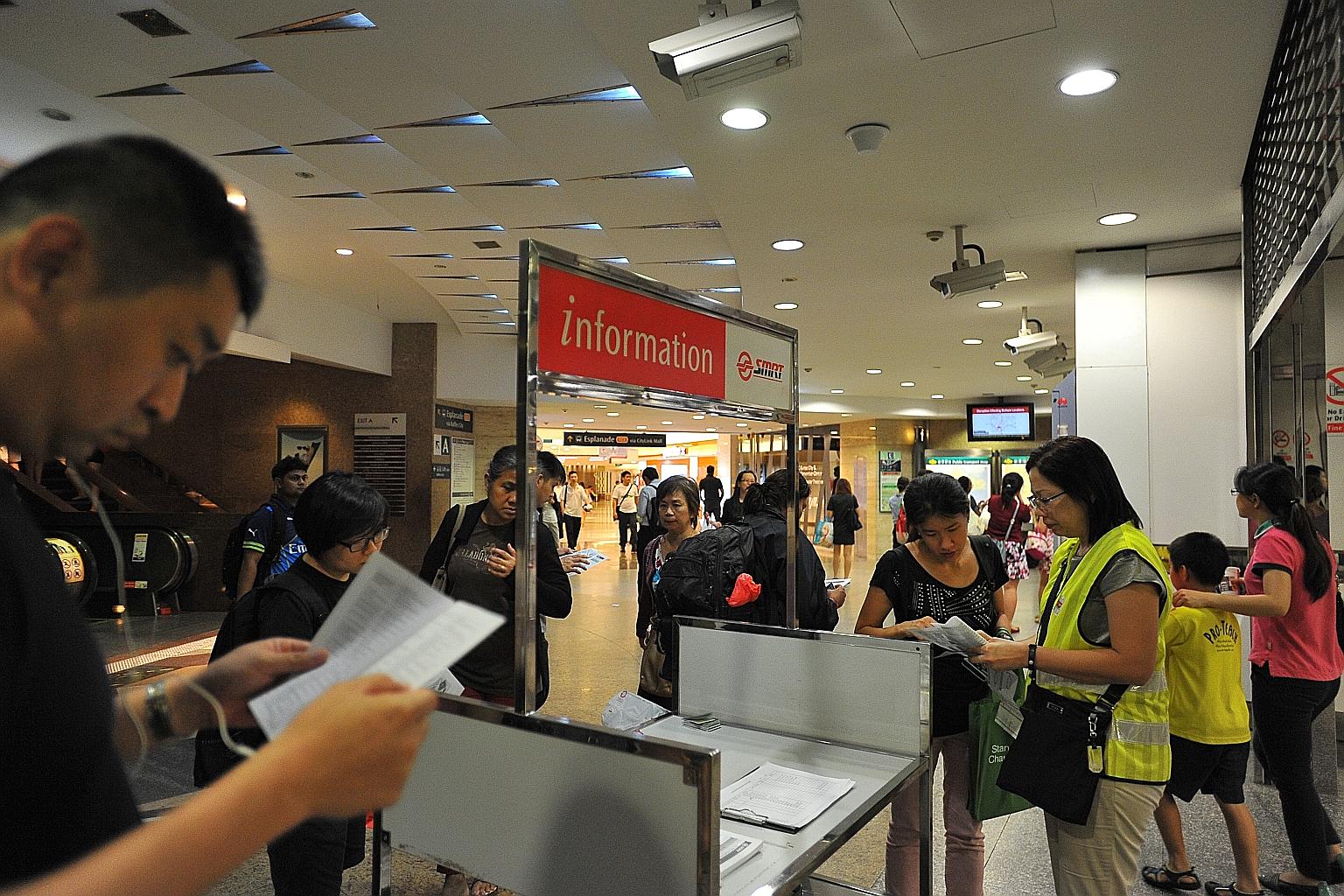 Commuters at City Hall MRT station during the breakdown of the North-South and East-West lines on Tuesday.
