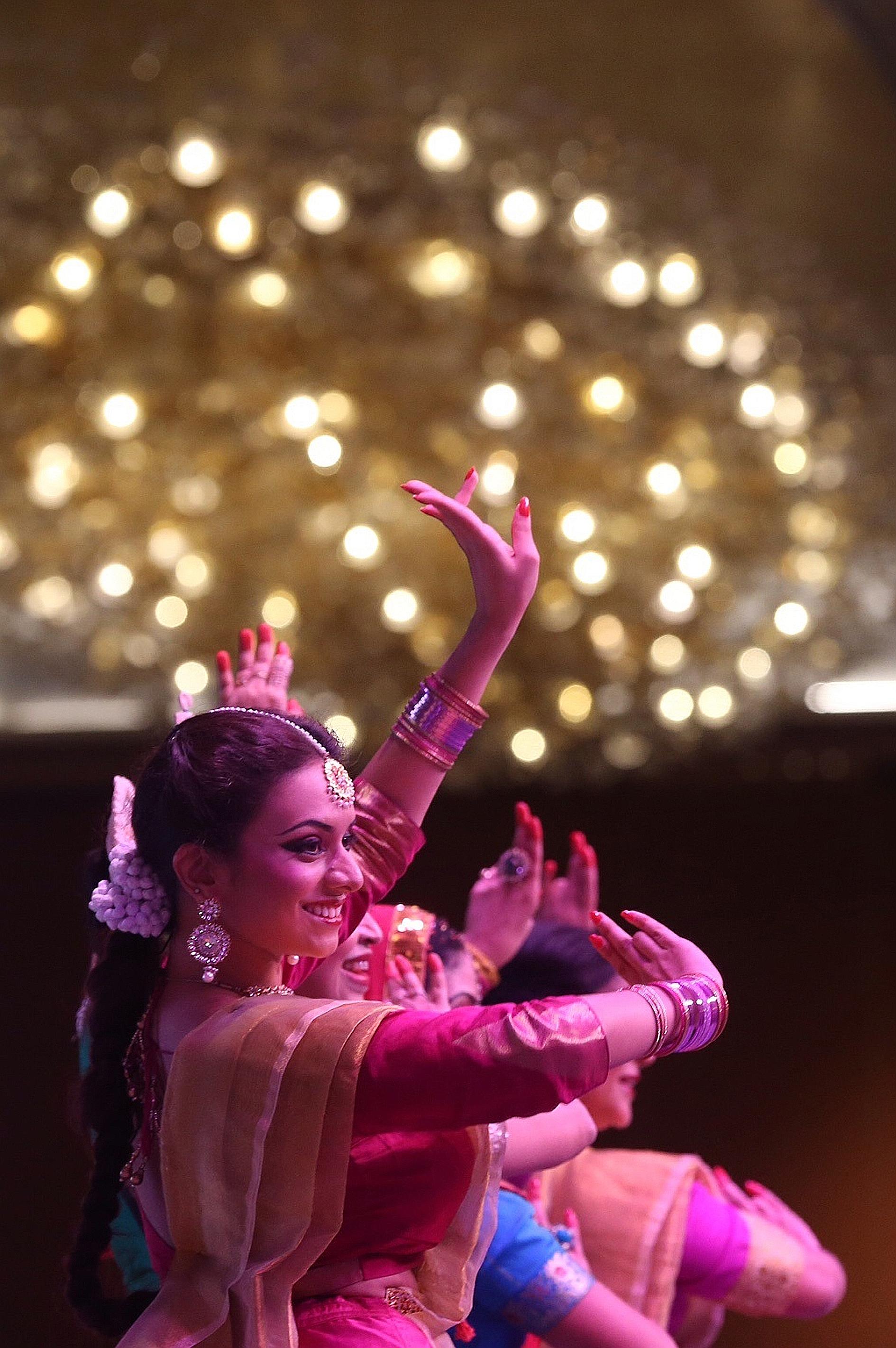 More than 2,300 people from various ethnic and religious groups - including President Tony Tan Keng Yam, as well as local politicians and diplomats from 21 countries - dined as they watched cultural performances at Marina Bay Sands yesterday. The 12t