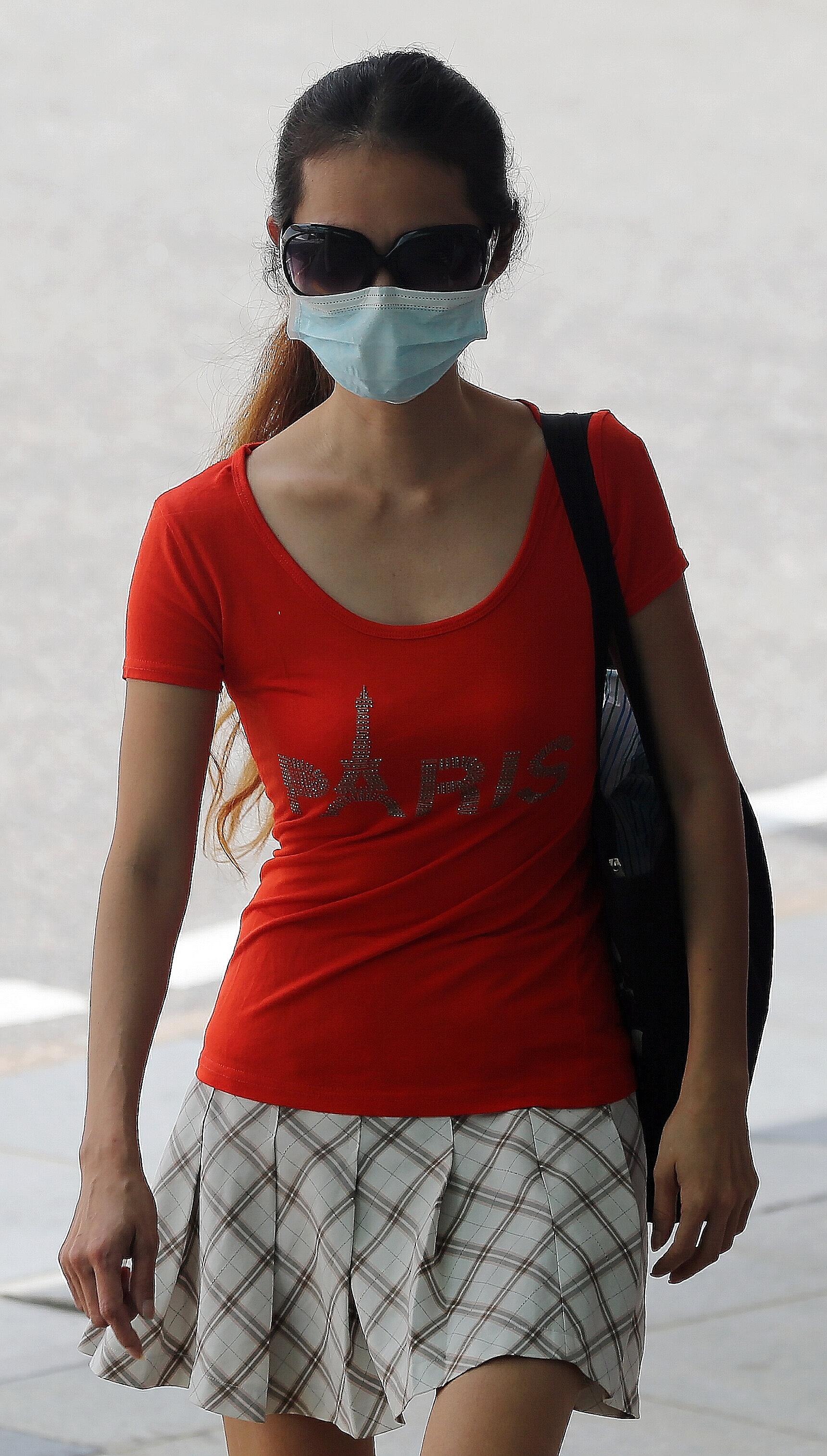 Ng Huay Yin (right) and Ooi Chong Hee allegedly told a 76-year-old resident they were town council contractors.