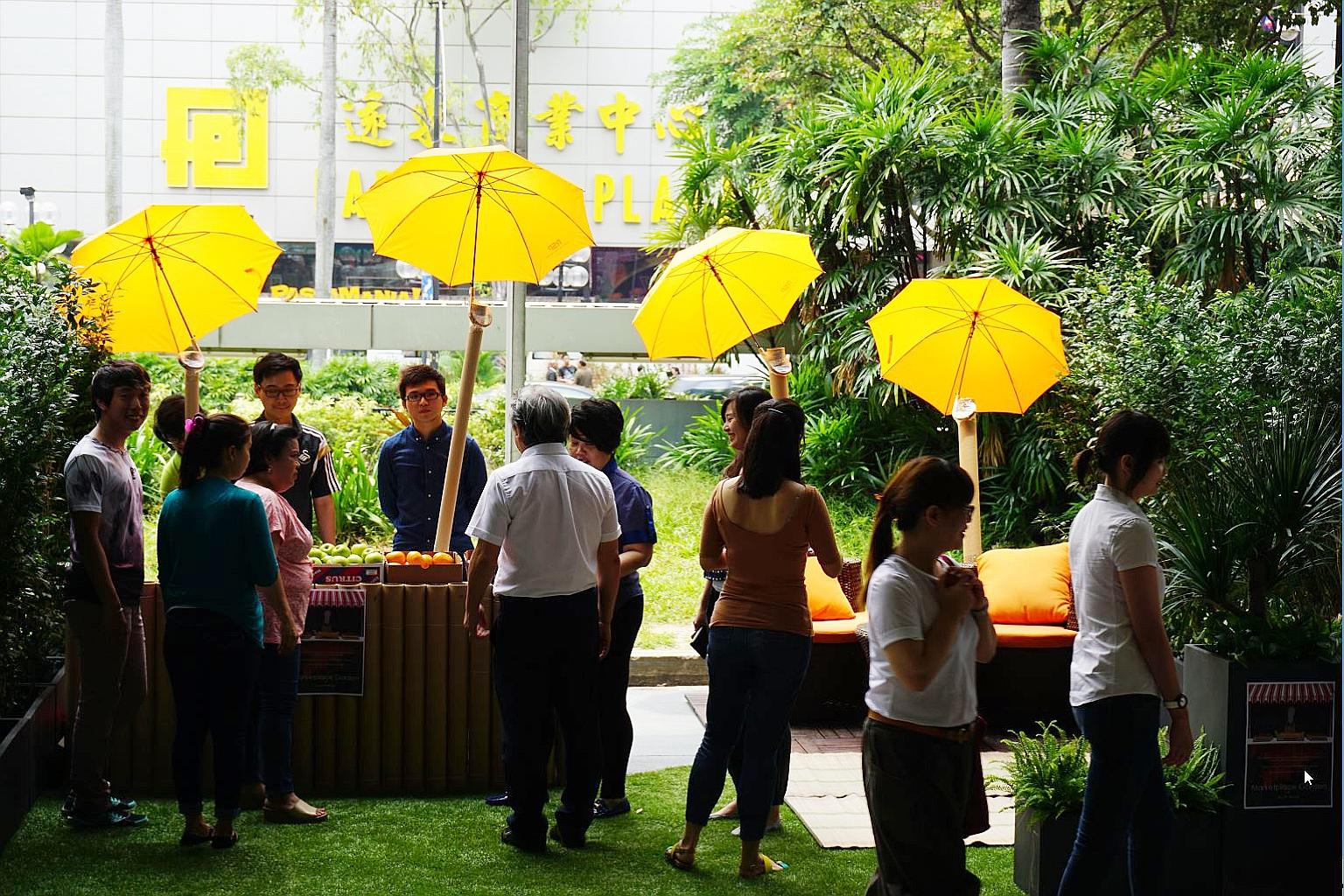 One of last year's PARK(ing) Day initiatives was this "marketplace meets garden" set up in parking spaces at Scotts Road.