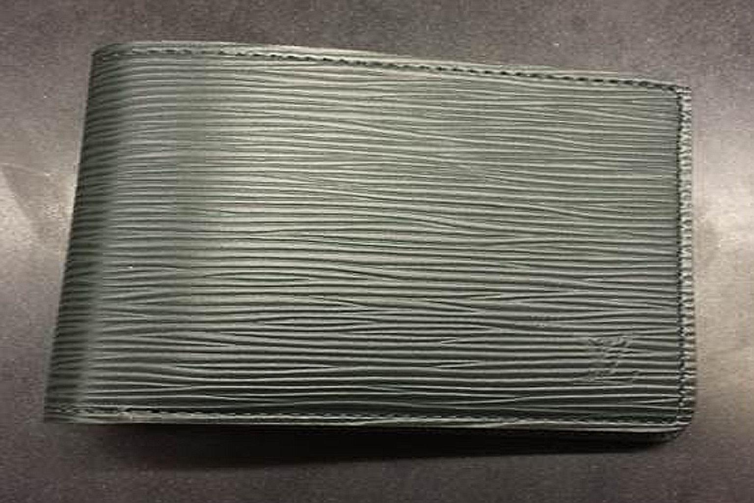A wallet from Louis Vuitton's Epi line.