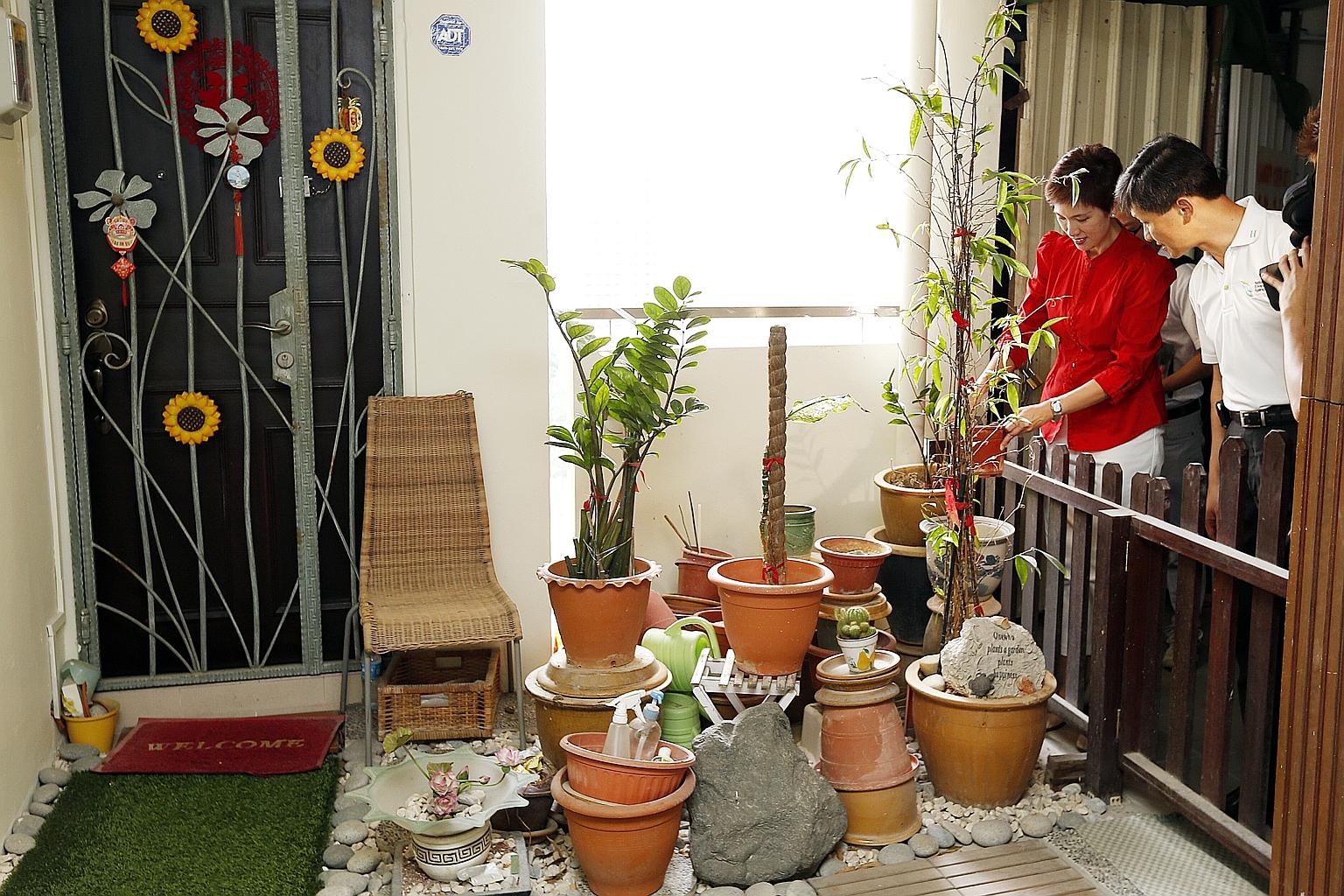Senior Minister of State Josephine Teo and NEA chief executive Ronnie Tay visited residents in Bishan North yesterday to urge them to stay vigilant in the battle against dengue.