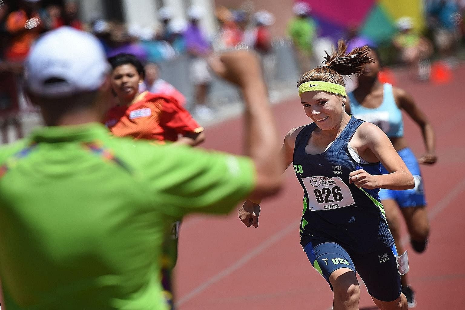 Rufina Shagardanova of Uzbekistan winning her track heat at the 2015 Special Olympics World Games in Los Angeles on Sunday. About 6,500 amateur athletes from 165 countries are taking part in this year's Games. The competition, started in 1968, has gr