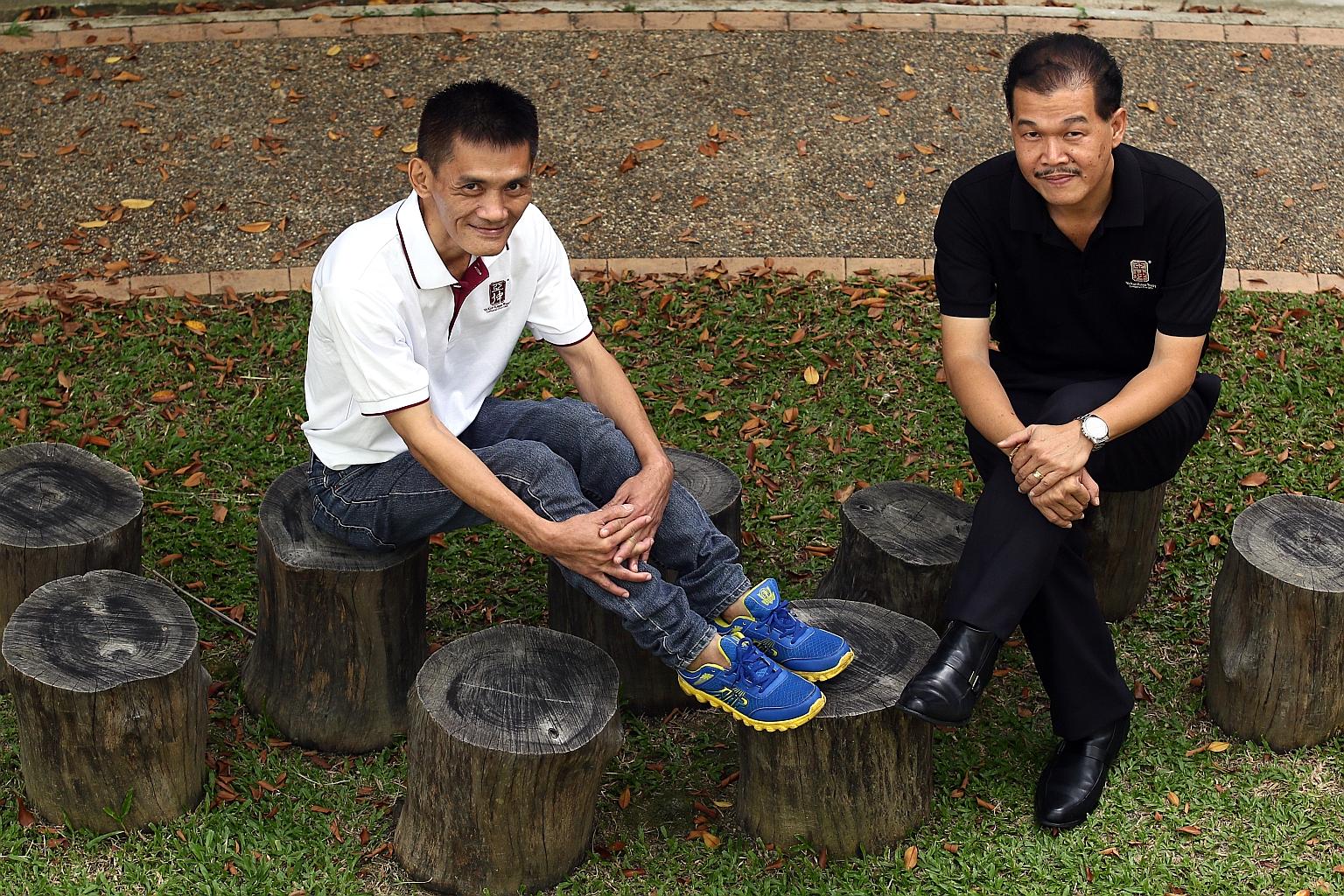 Ex-offender Richard Tee (in white T-shirt) nominated Mr David Wong for the Model Supervisor Award for helping him settle into his job at Ya Kun.
