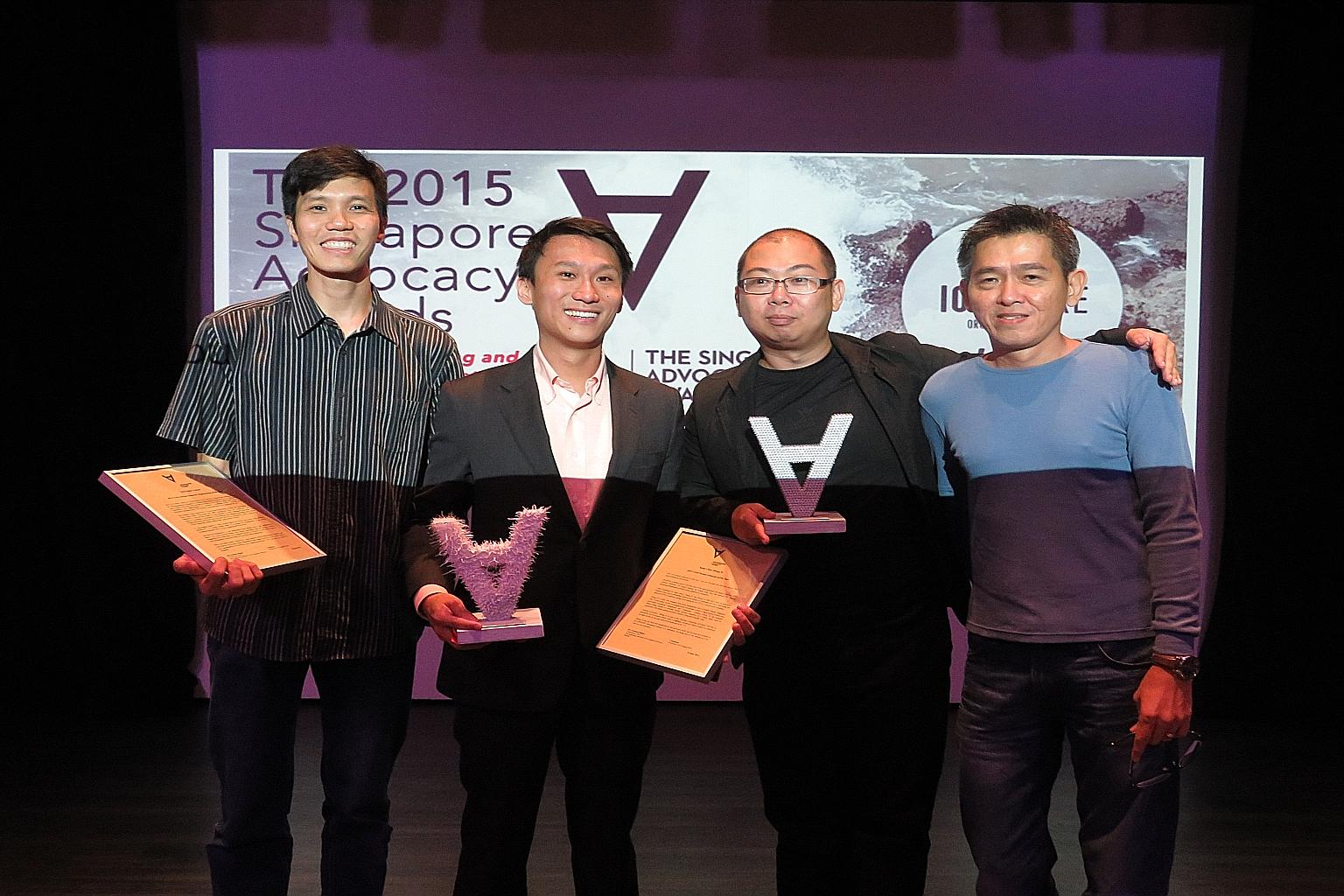 Civil society advocate of the year Remy Choo Zheng Xi (second from left) with civil society advocate organisation of the year The Online Citizen's editors (from left) Howard Lee, Terry Xu and Andrew Loh attending the awards event yesterday.