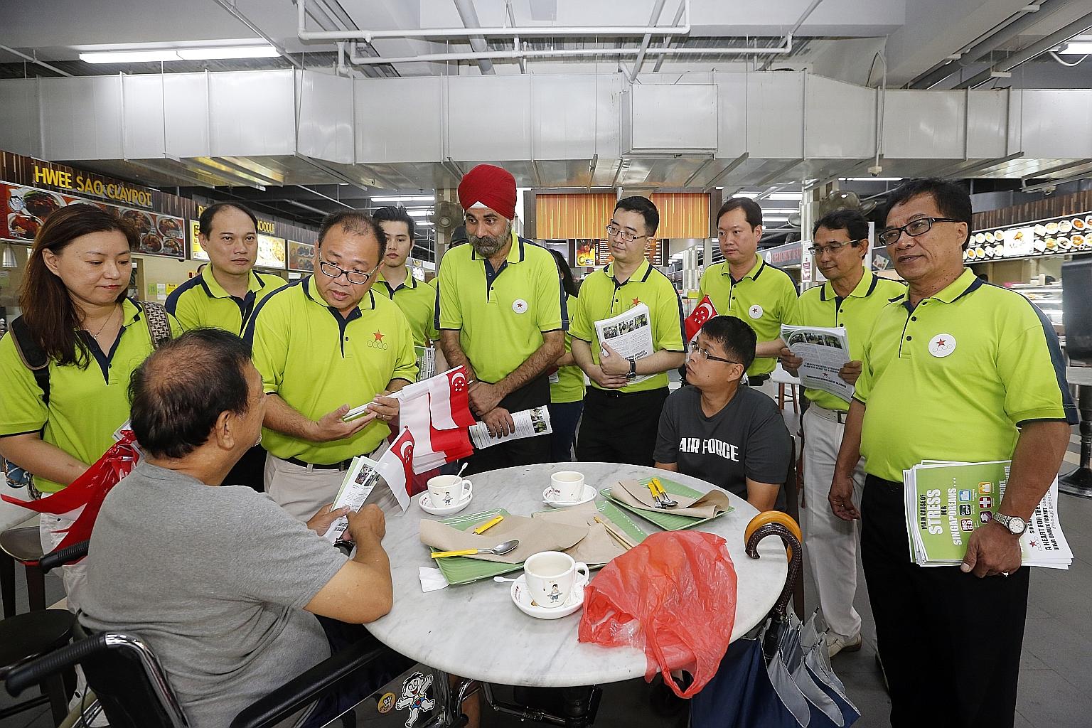 The Singapore Democratic Alliance distributed party leaflets and Singapore flags during a walkabout at Sengkang Square yesterday. The party is returning to contest six-MP Pasir Ris-Punggol GRC.