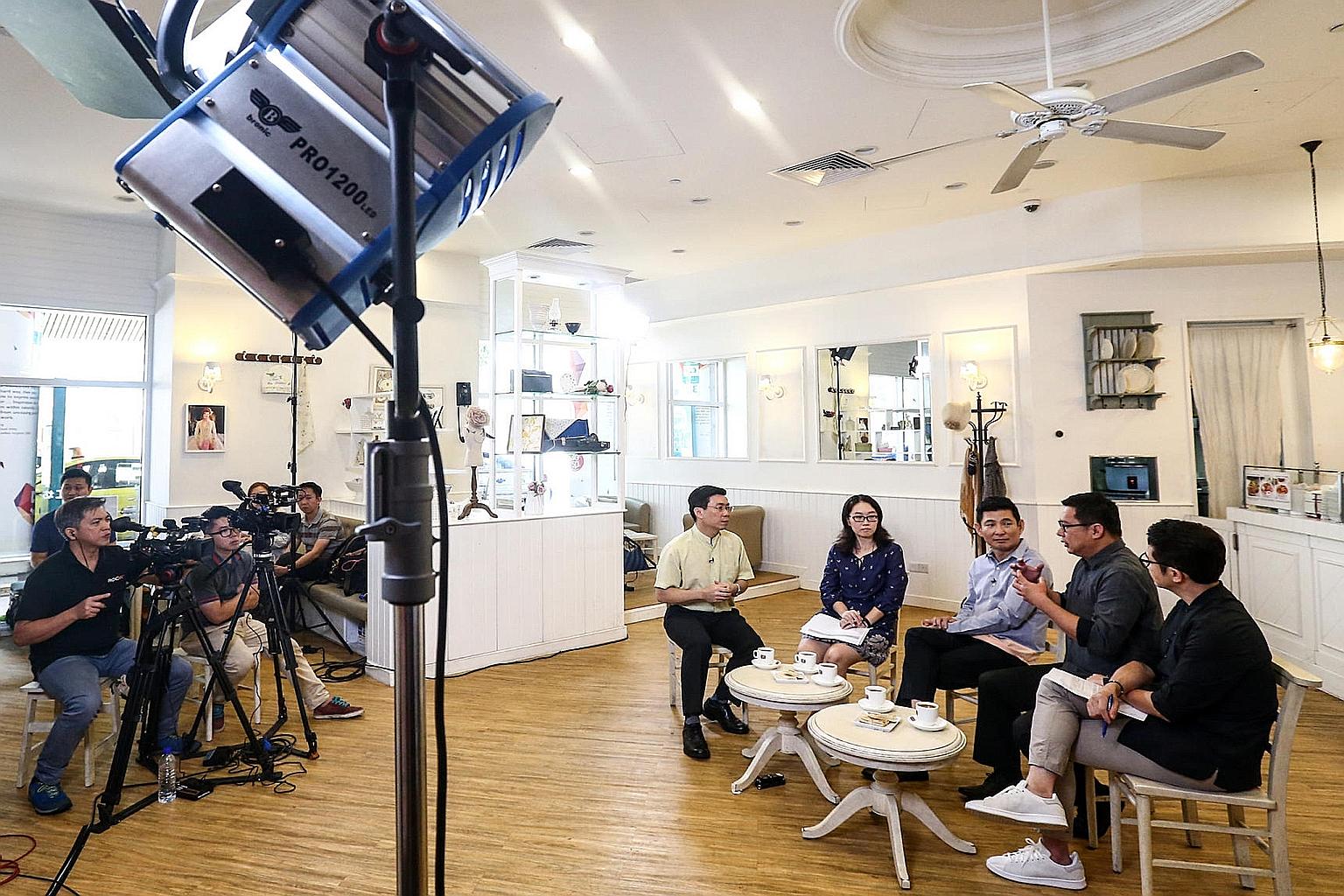 The panel, from left: Mr Lee Yi Shyan, Senior Minister of State for Trade and Industry and National Development, Ms Chen Jing, Lianhe Zaobao reporter, Mr Samuel Ng, chief executive officer of voluntary welfare organisation Montfort Care, Mr Chua Chim