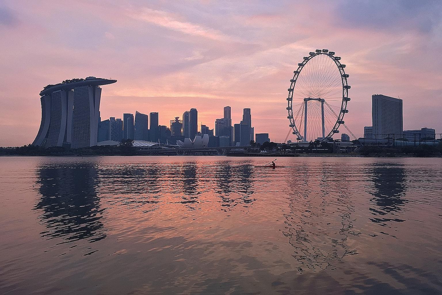Mr Terence Lee whipped out his iPhone 6 when he spotted a lone kayaker in Marina Bay last December.