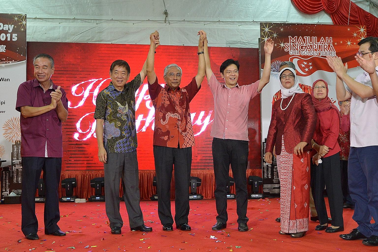 From left: Sembawang GRC anchor minister Khaw Boon Wan, Mr Hawazi Daipi, Culture, Community and Youth Minister Lawrence Wong, Speaker of Parliament Halimah Yacob and Mr Hawazi's wife, Madam Essah Hussain, at the Marsiling National Day dinner yesterda