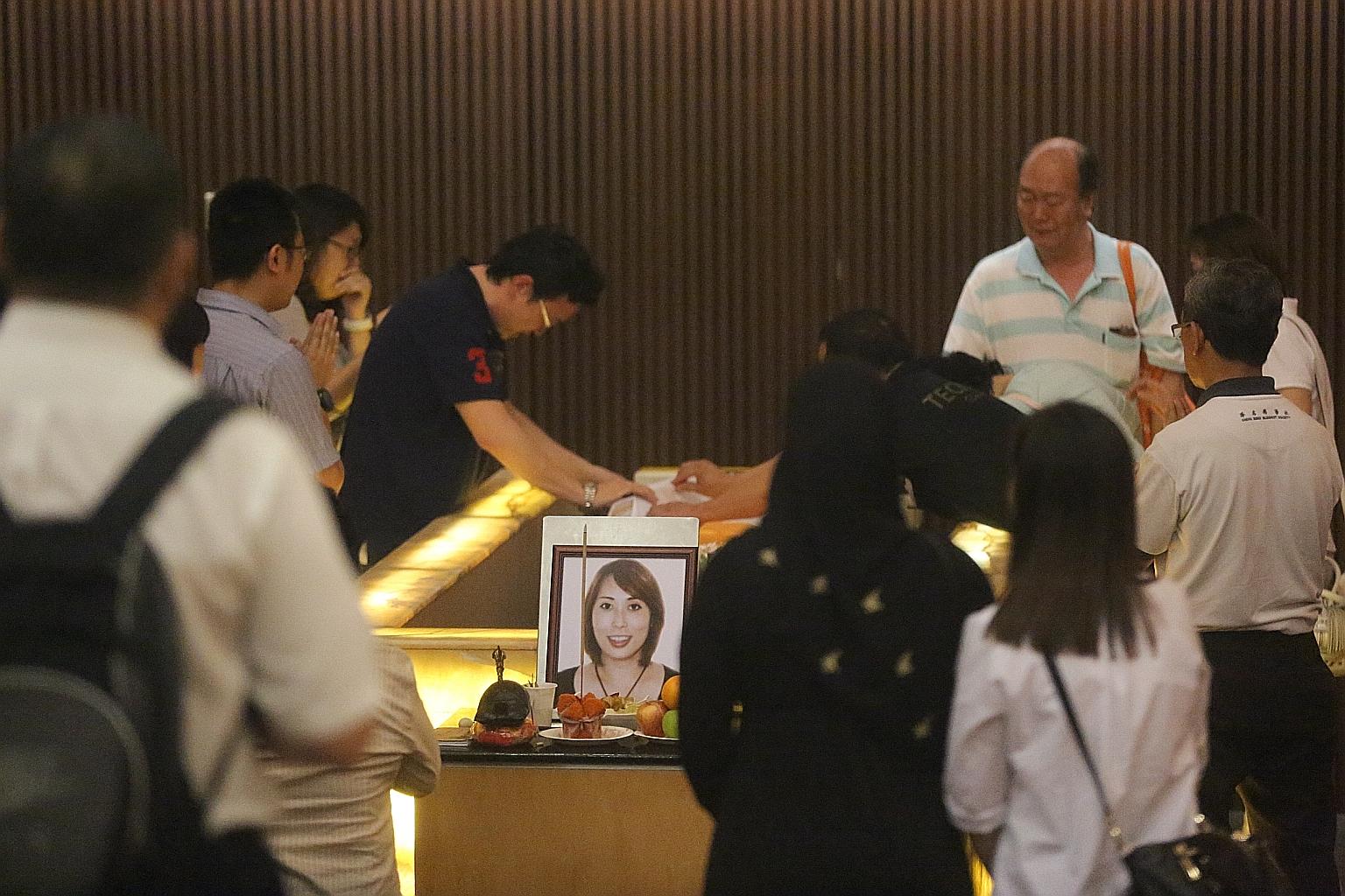 Madam Koh Siang Hua died after her husband Ong Wei Poh inflicted 30 wounds on her head, chest, back and limbs - some so deep that they cut into the bone. He also slashed her neck, cutting a jugular vein.