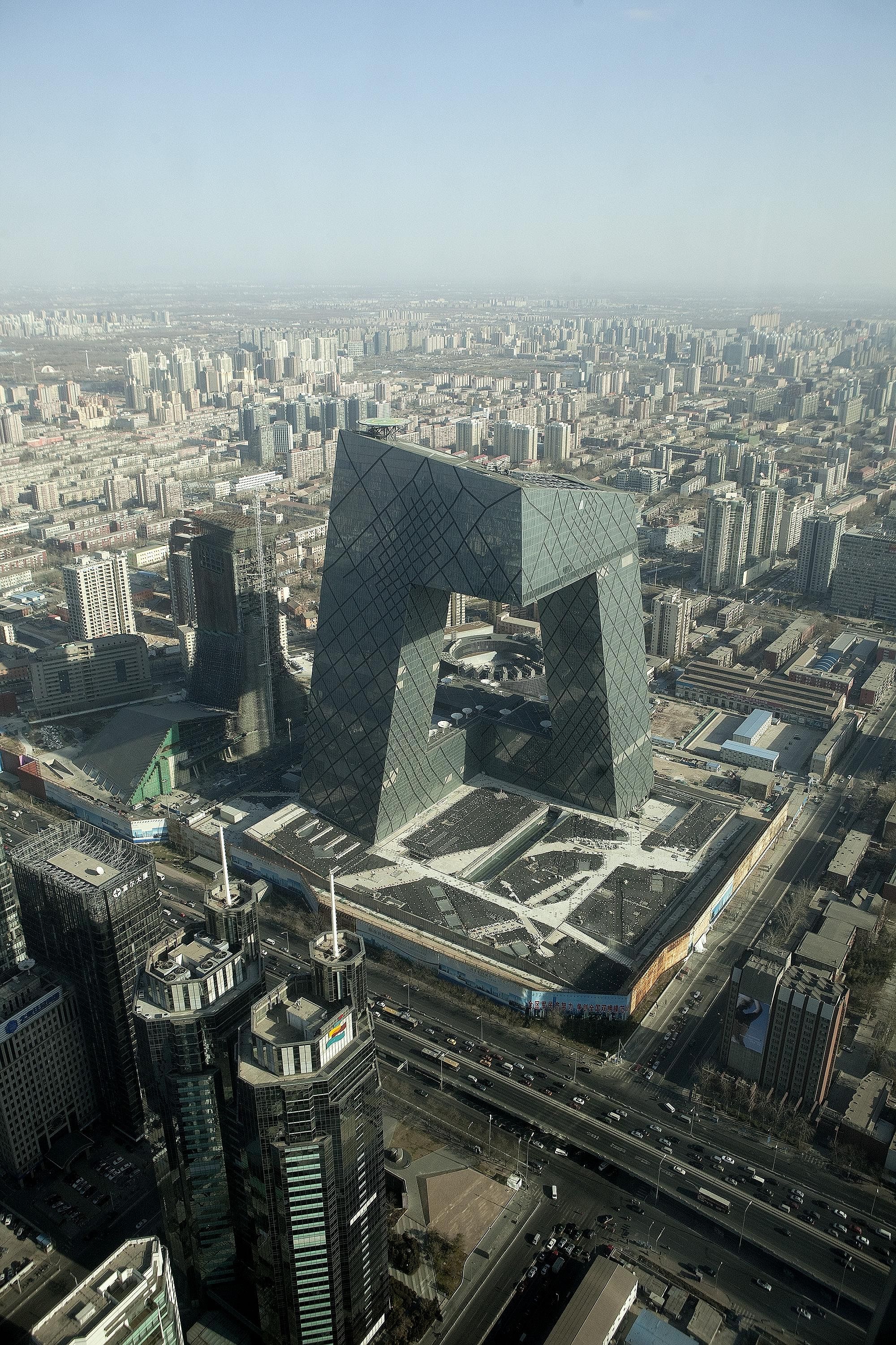 The China Central Television, or CCTV, Tower in Beijing. The wedge-shaped "Termite's Nest" building was damaged by a fire in 2009.