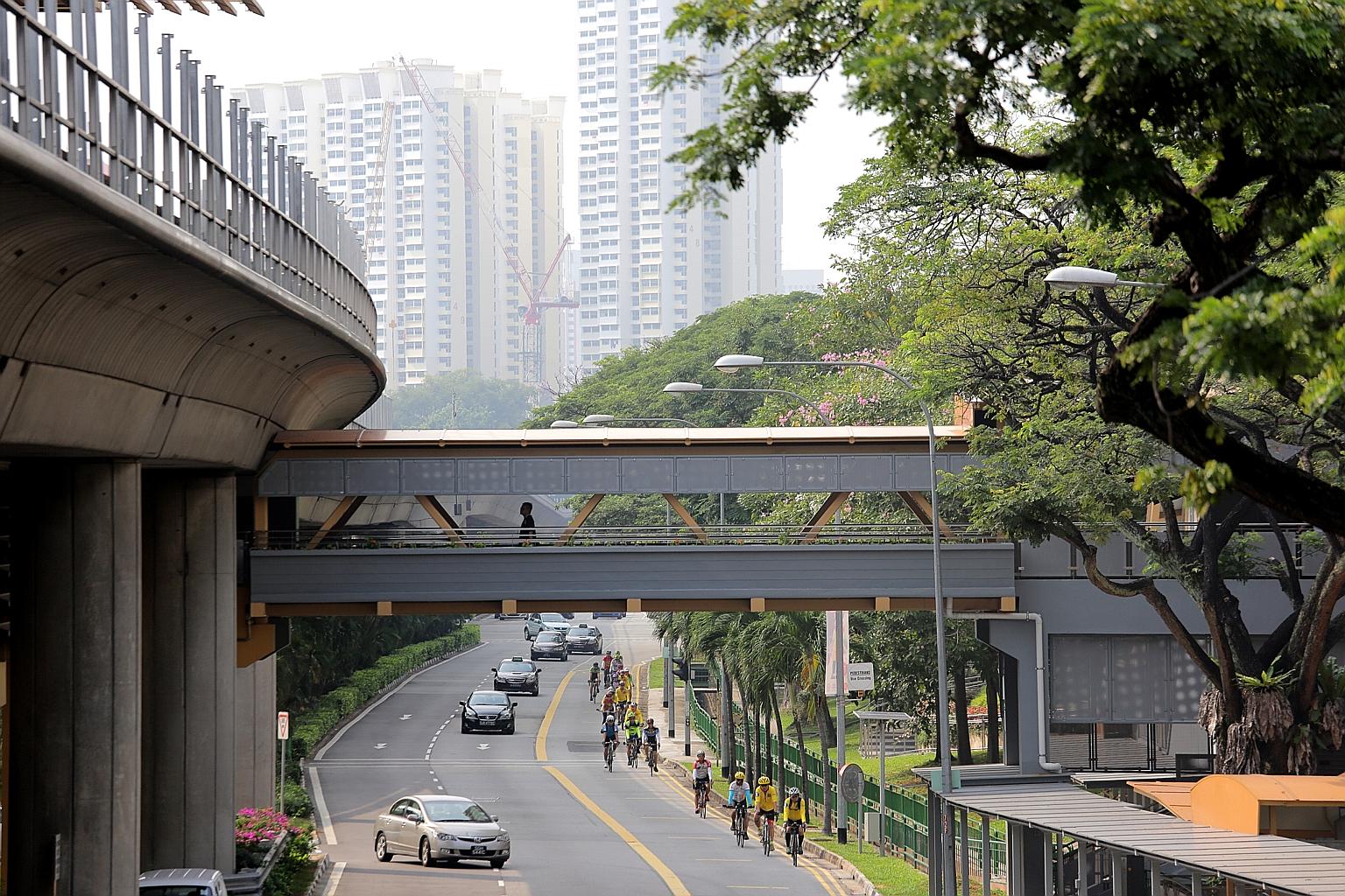 The new link bridges at Commonwealth station (above) and Queenstown station give commuters more access points and come with covered walkways to nearby housing estates.