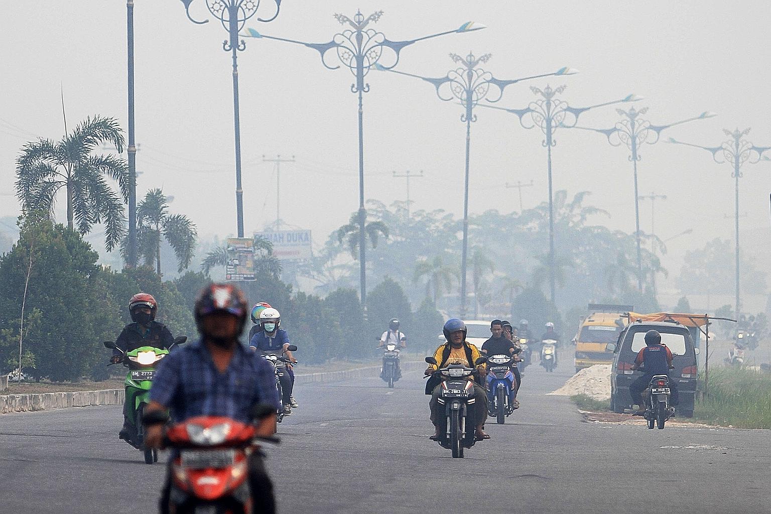 Haze from forest fires enveloping Pekanbaru in Sumatra this year. The haze issue is a sensitive one between Singapore and Indonesia.